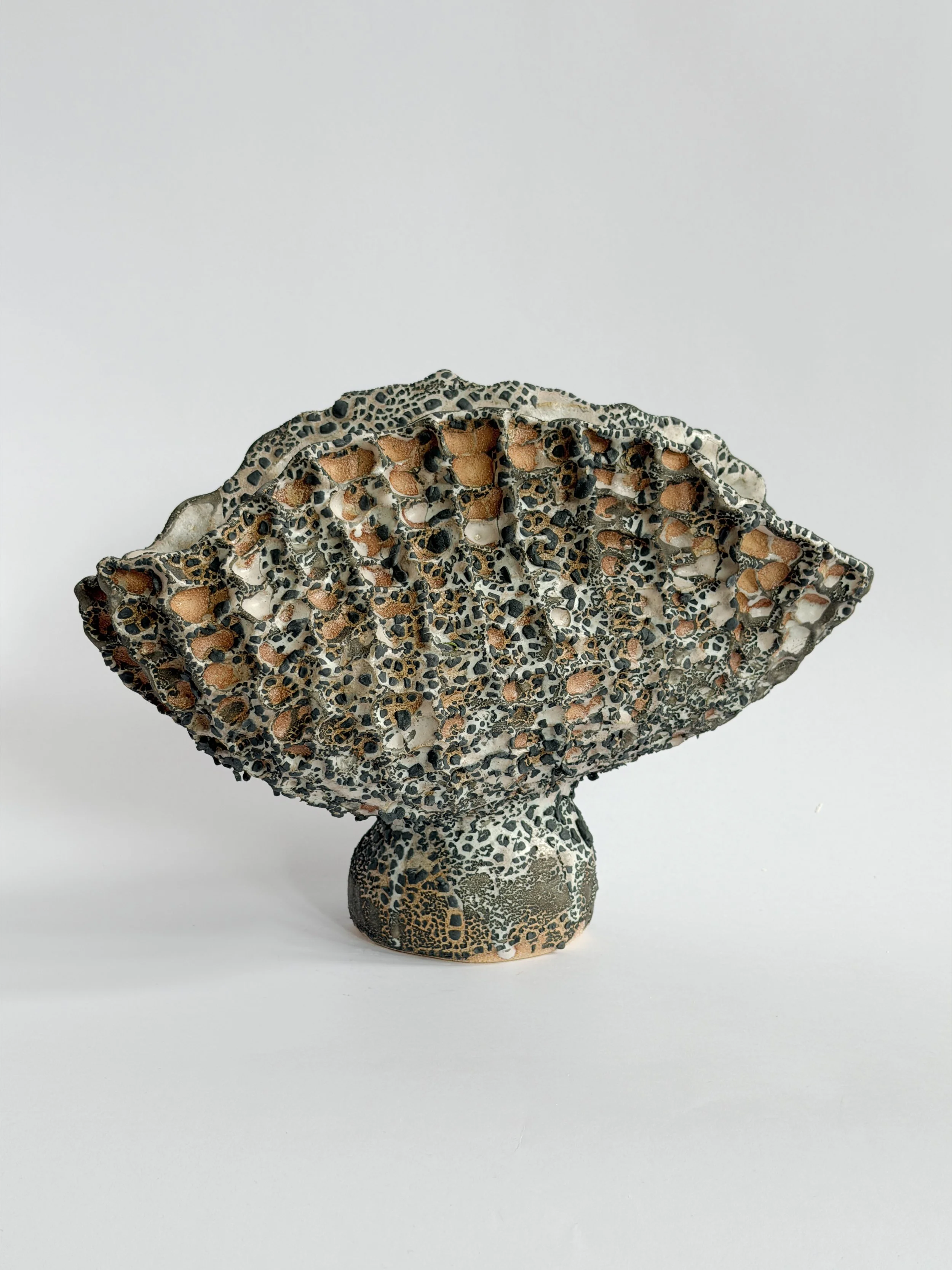 Coral Vase with Black — hand-built ceramic vase with a honeycomb, coral-like surface finished in black, by Anastasia Babenko
