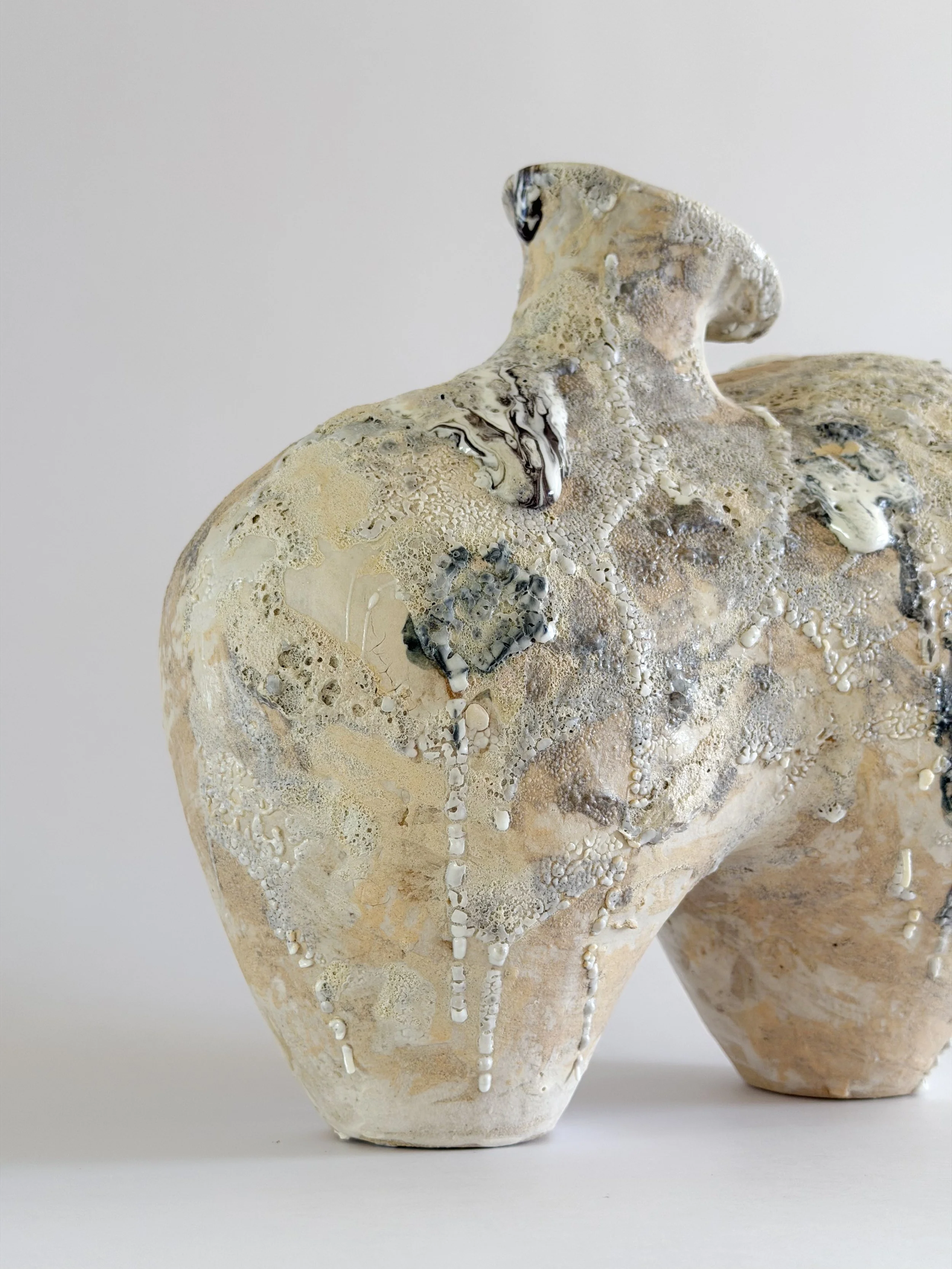 Form No. 1 — hand-built ceramic vase with two full volumes resting under a crawling, sand-colored mineral crust, by Anastasia Babenko