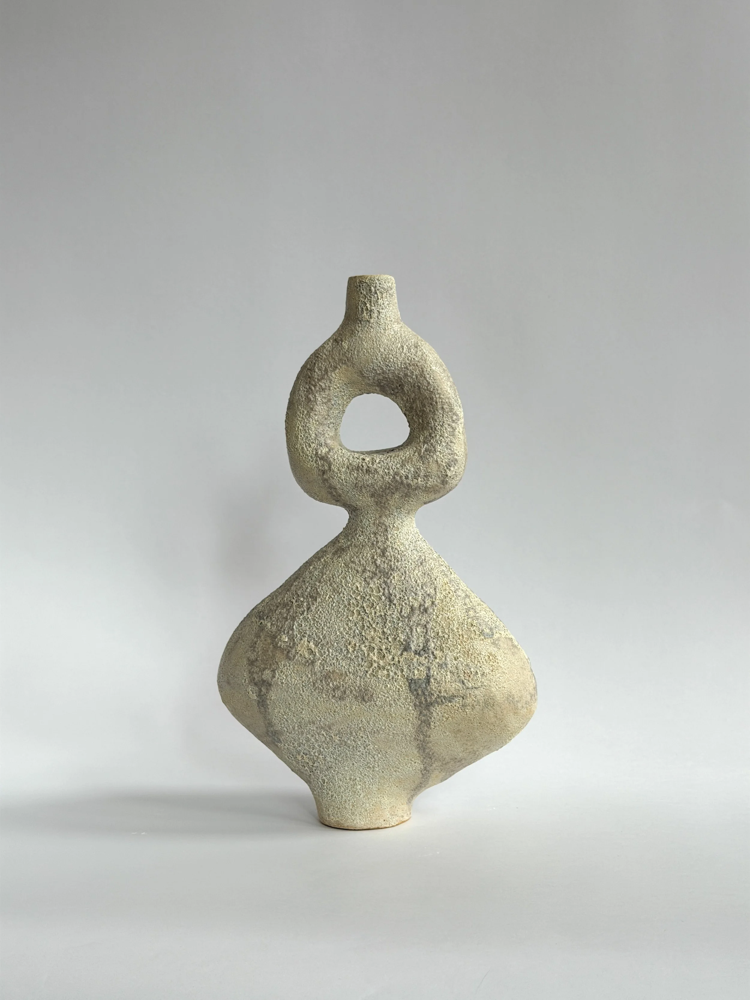Dancers Vase Set, of rounded forms caught mid-motion, rising to looped openings — sculptural ceramic vase set made for considered, organic