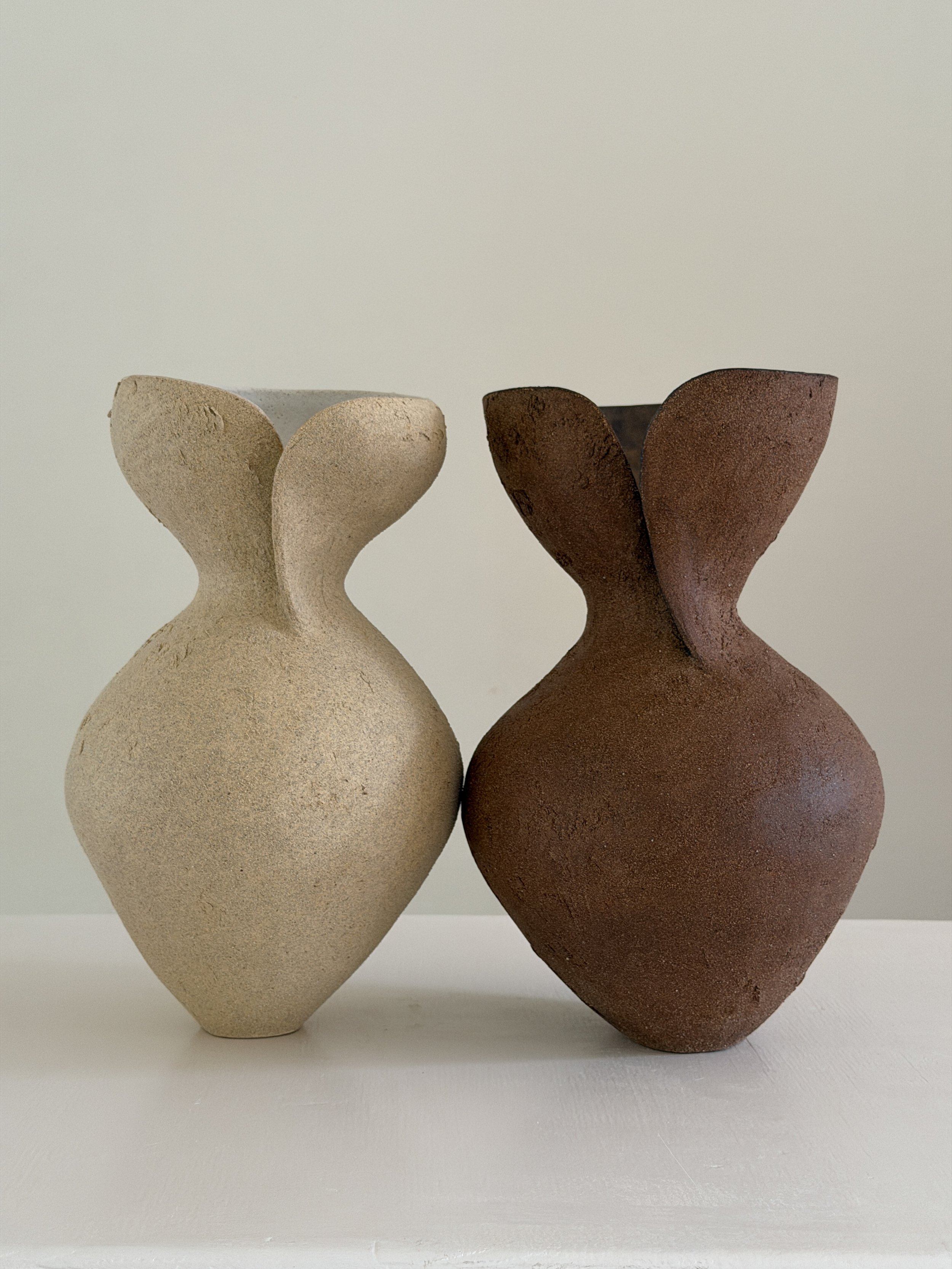 Silhouette Vase in Brown, tracing a woman's full, rounded silhouette in warm brown stoneware — sculptural ceramic vase made for considered,