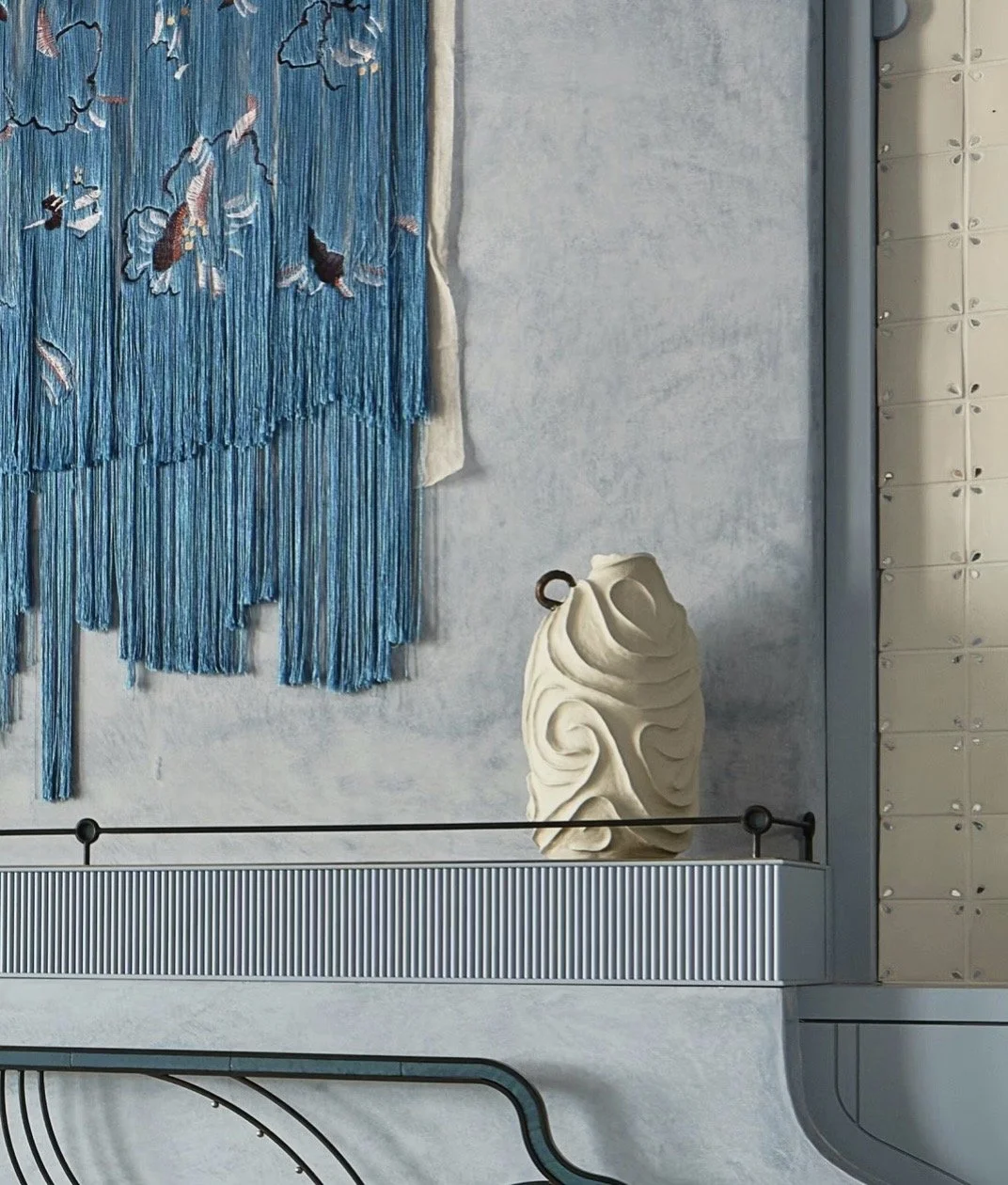 White sculptural ceramic vase by Anastasia Babenko on the mantel of the 2026 San Francisco Decorator Showcase living room by Peruri Design Company