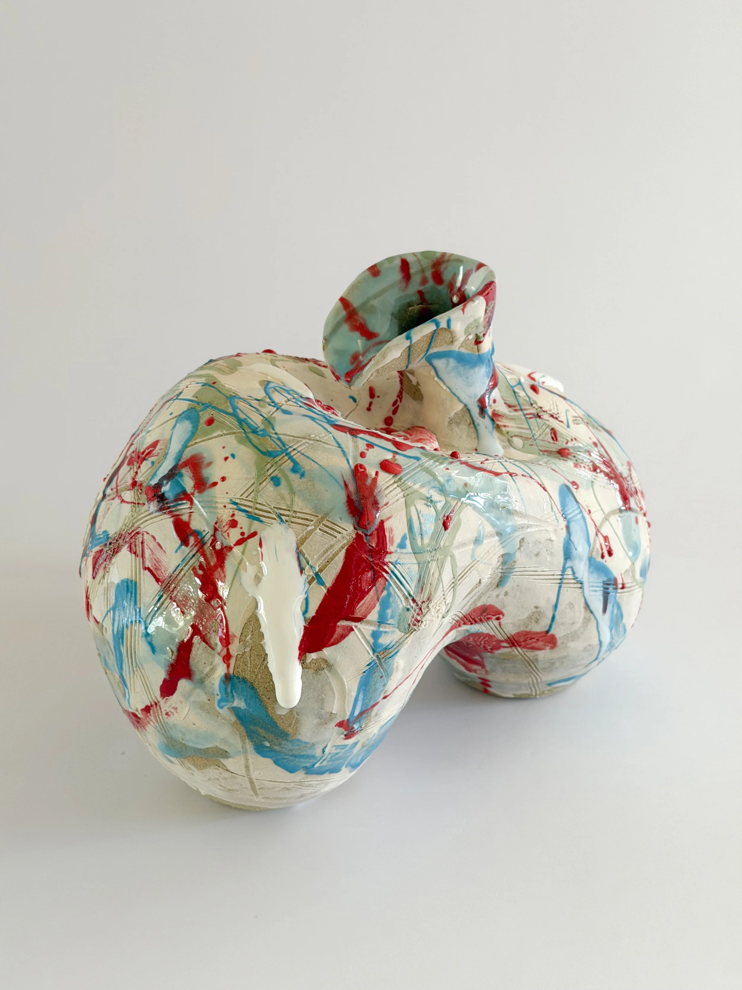 Form No. 2 by Anastasia Babenko — with runny white glaze over red, turquoise and green and fine incised lines, sculptural decor for