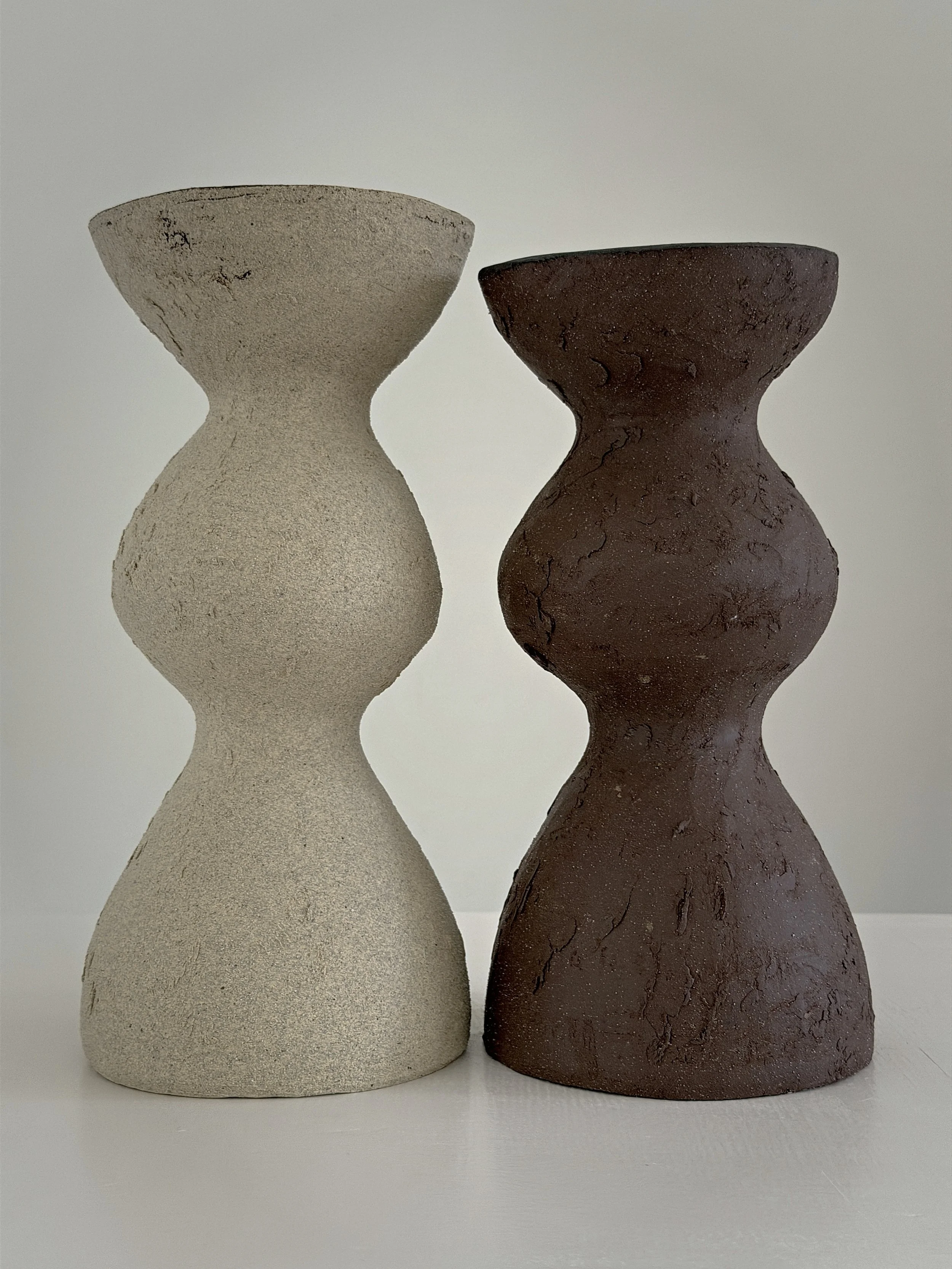 Beige Totem Vase: with a brutalist, totem-like silhouette in raw beige stoneware, a sculptural ceramic vase by Anastasia Babenko