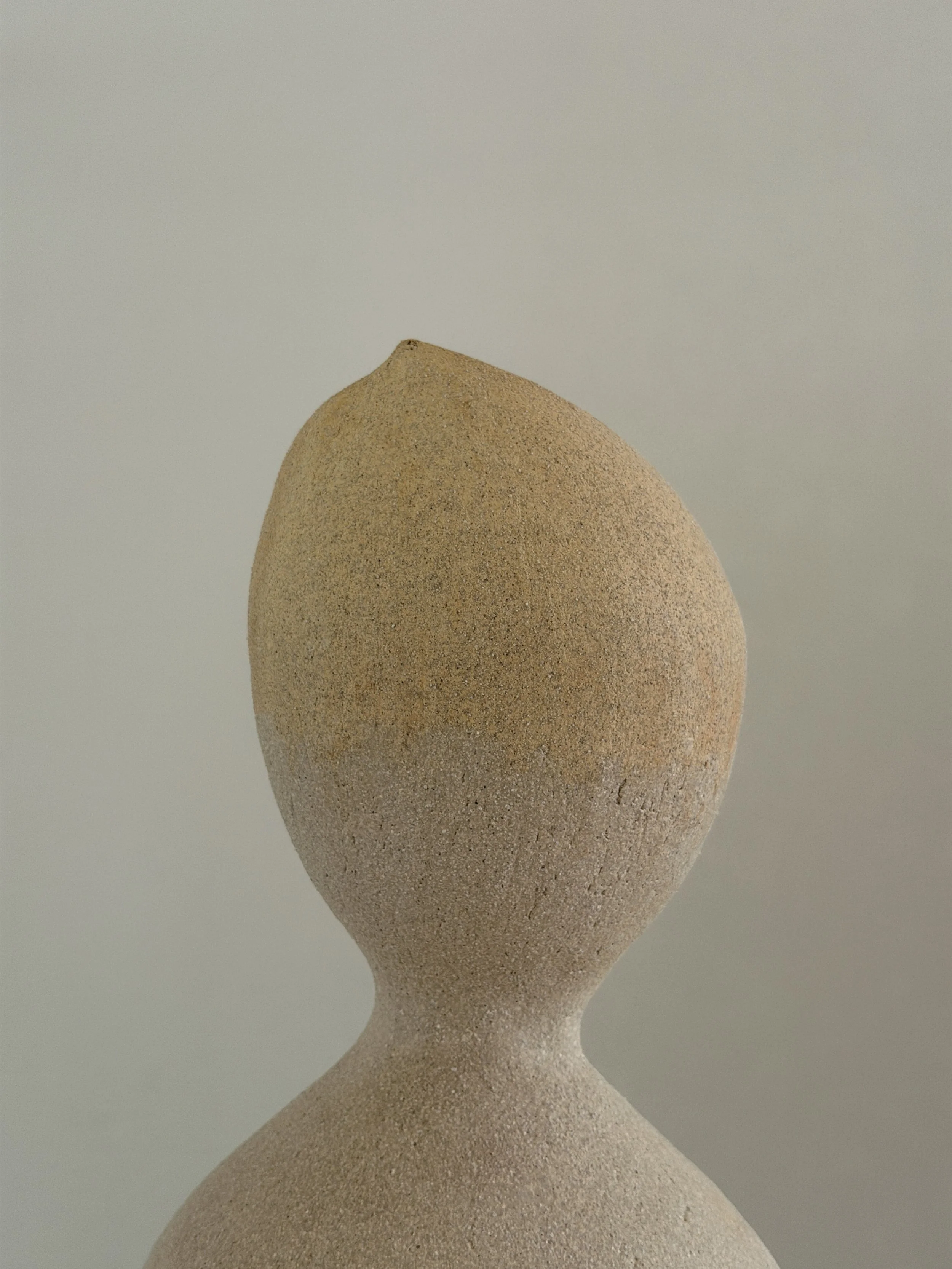 Hand-built ceramic vase: Woman 4, in the form of a woman at rest, soft and full, in warm beige stoneware — Anastasia Babenko