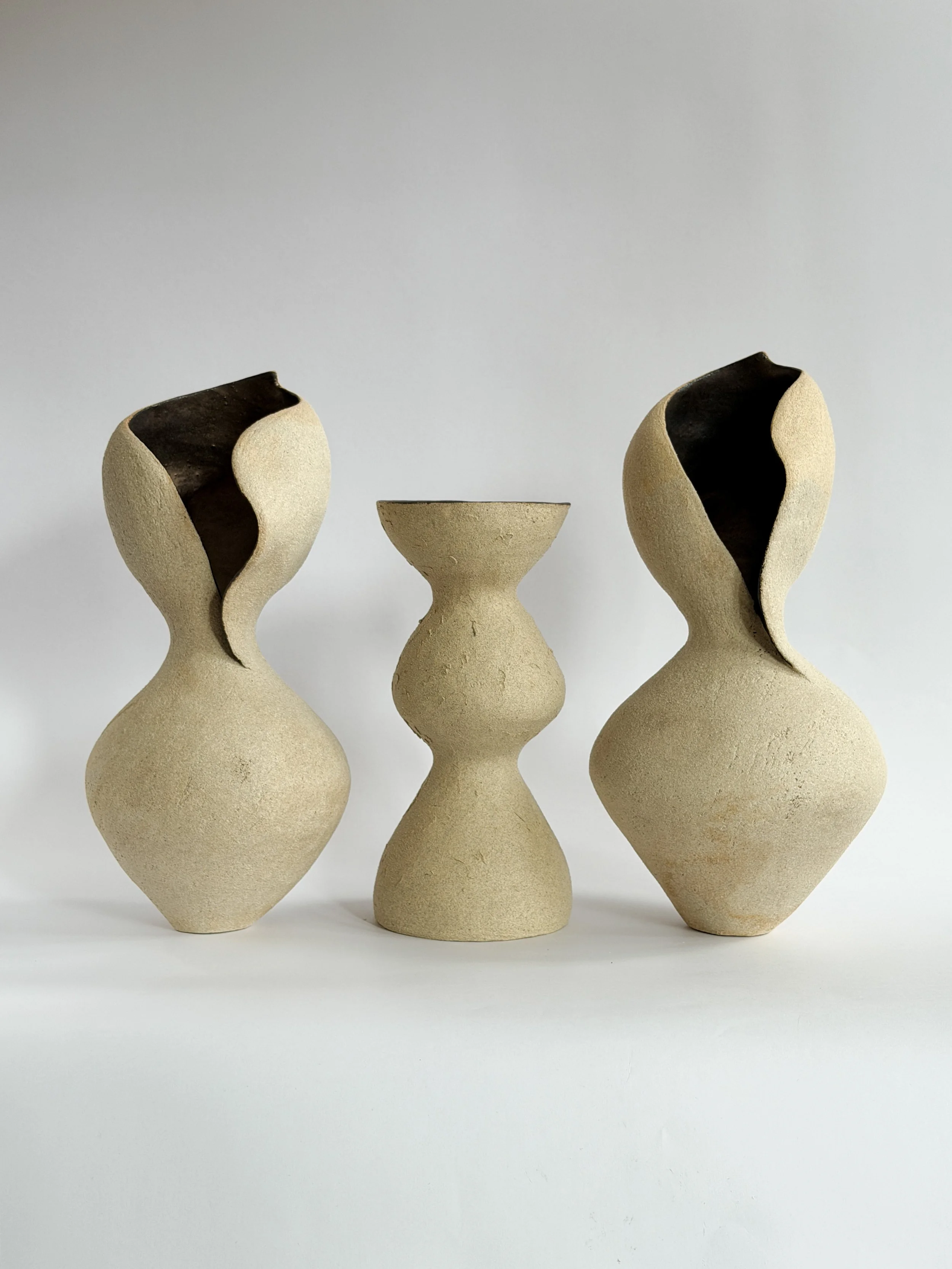Woman 4: in the form of a woman at rest, soft and full, in warm beige stoneware, a sculptural ceramic vase by Anastasia Babenko