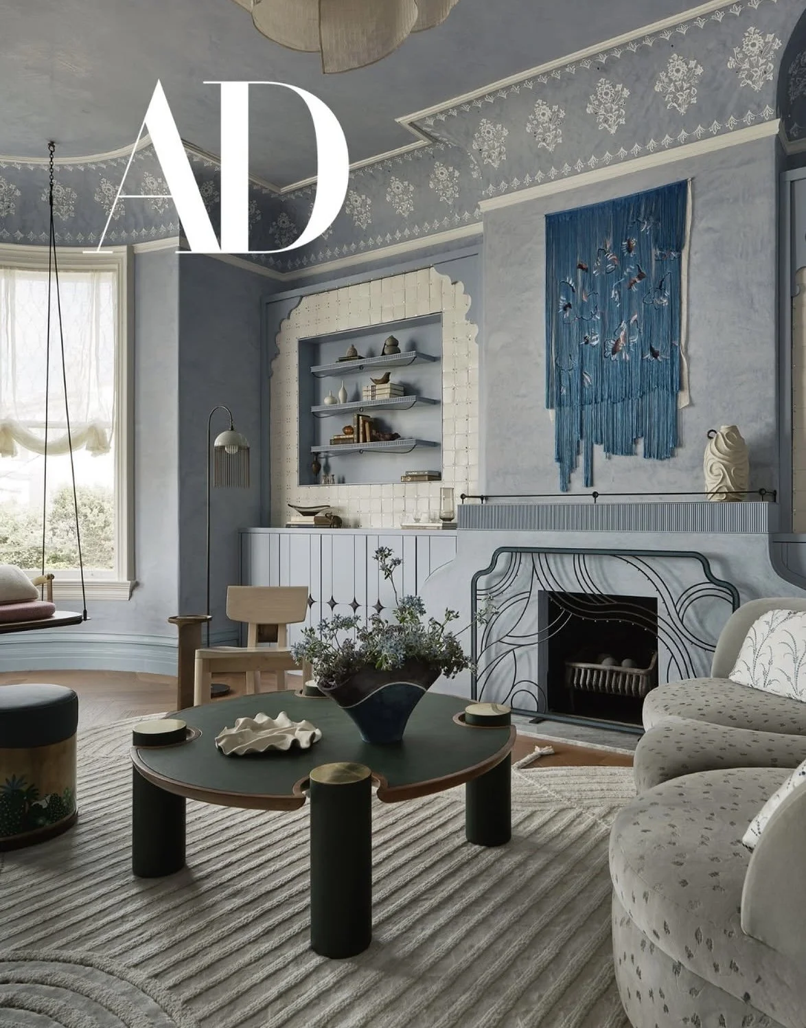 Hand-formed wavy ceramic tray on the coffee table with the white sculptural vase on the fireplace mantle behind, in the 2026 San Francisco Decorator Showcase living room designed by Peruri Design Company. Featured in Architectural Digest.