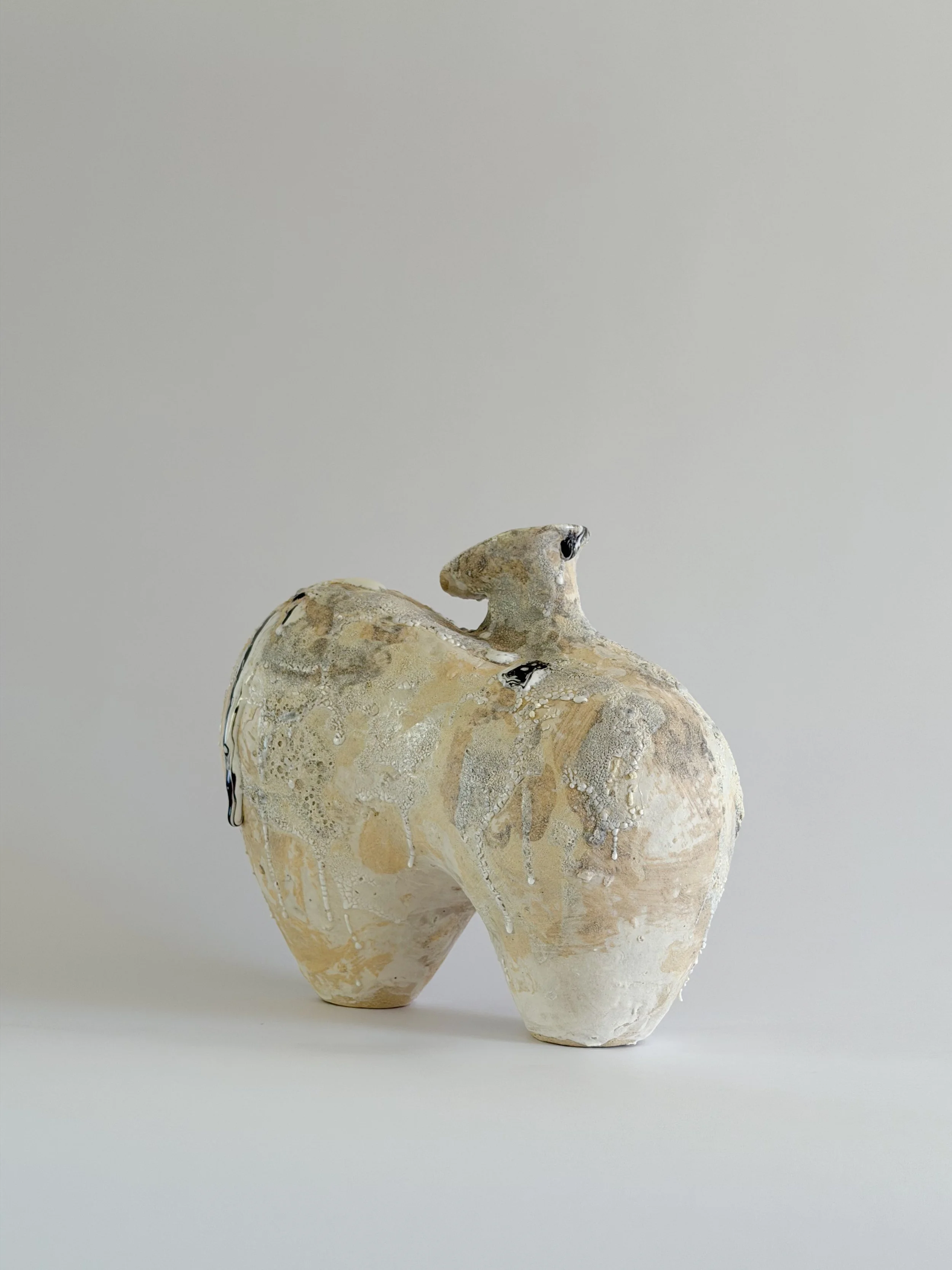 Hand-built ceramic vase: Form No. 1, with two full volumes resting under a crawling, sand-colored mineral crust — Anastasia Babenko