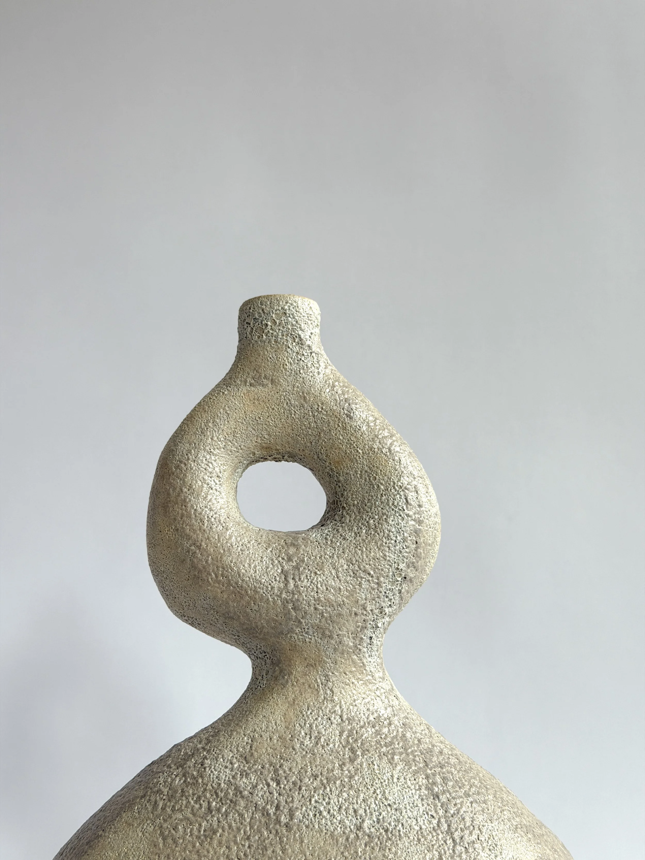 Dancers Vase Set by Anastasia Babenko — of rounded forms caught mid-motion, rising to looped openings, original ceramic art for interior