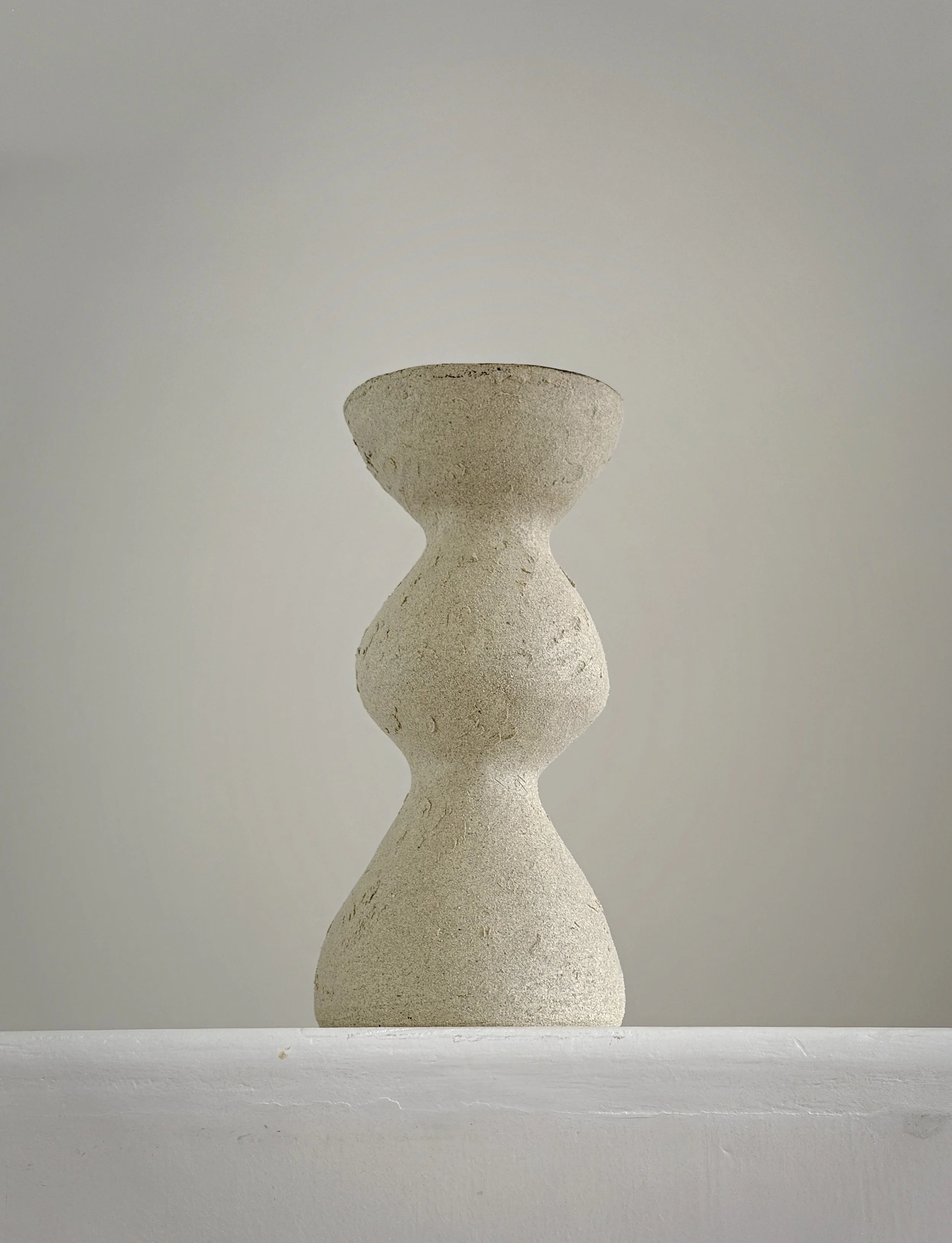 Beige Totem Vase: with a brutalist, totem-like silhouette in raw beige stoneware, a sculptural ceramic vase by Anastasia Babenko