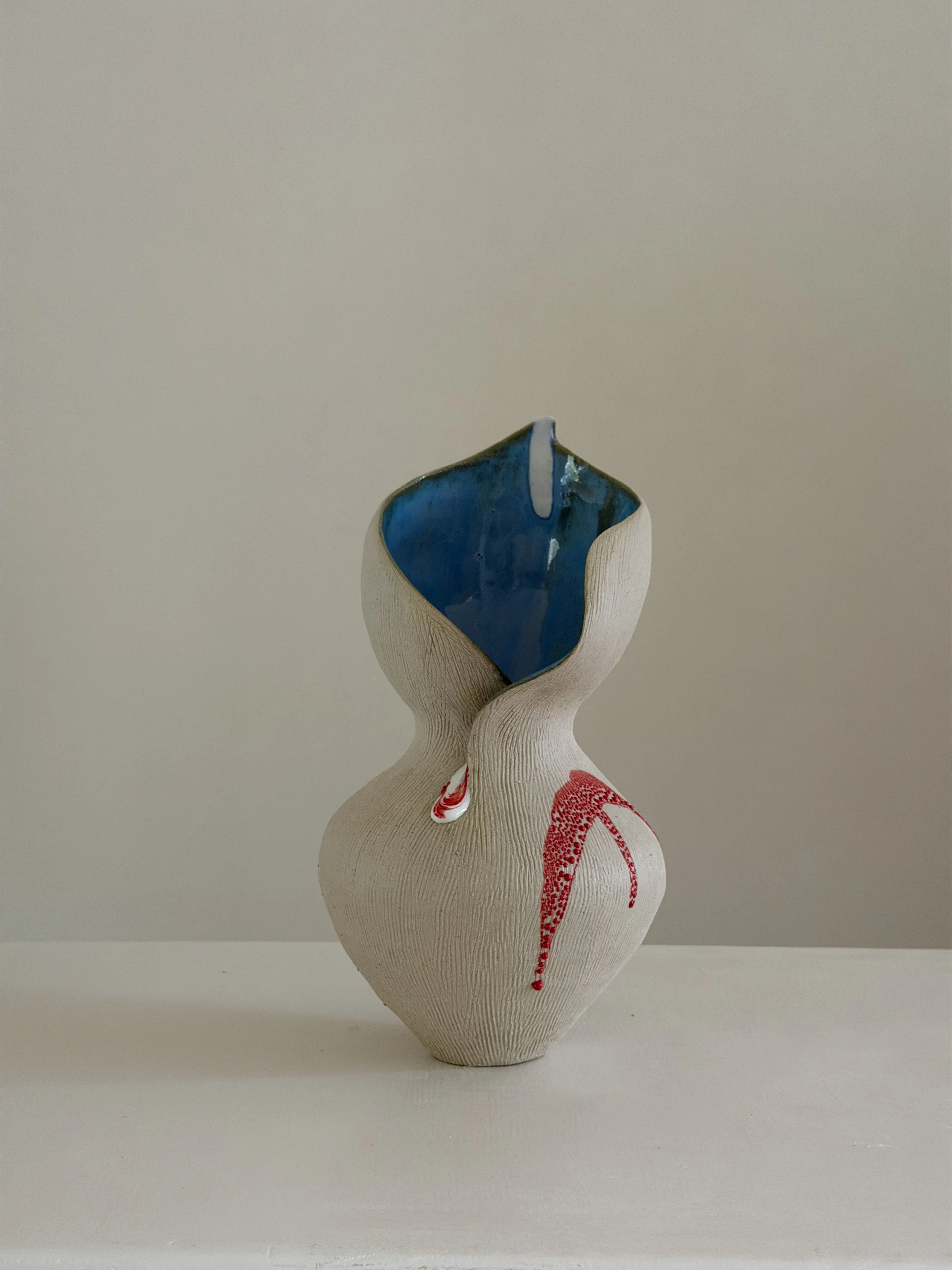She 6 — hand-built ceramic vase in the form of a resting woman, soft and full, by Anastasia Babenko