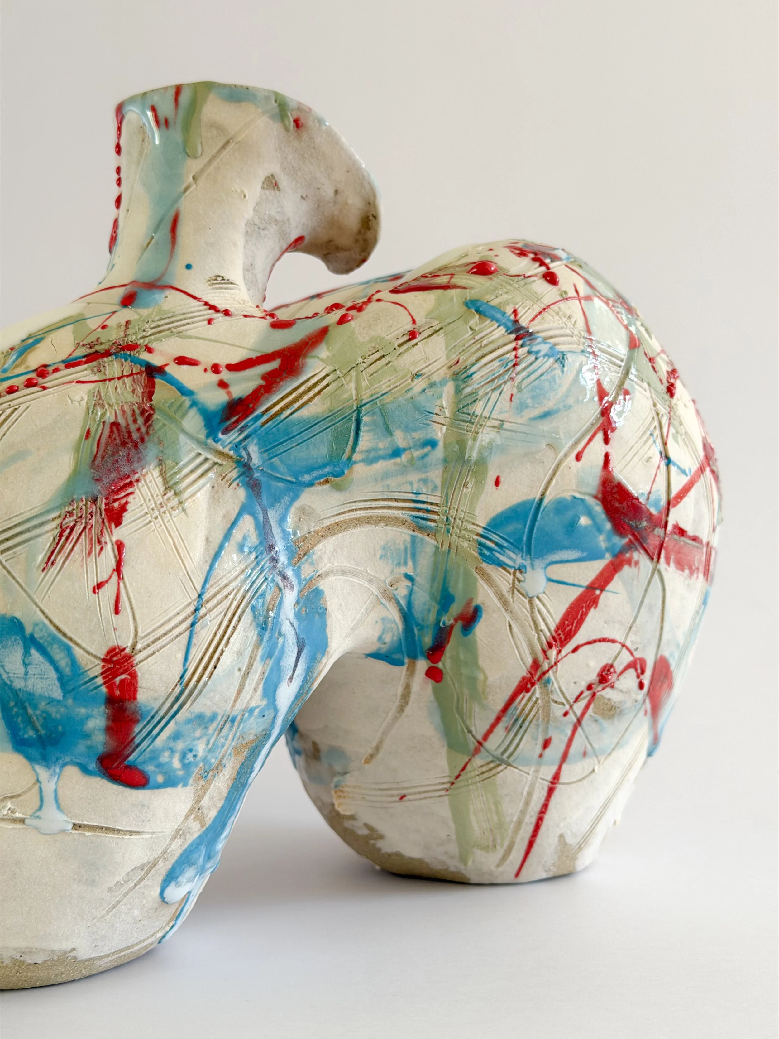 Hand-built ceramic vase: Form No. 2, with runny white glaze over red, turquoise and green and fine incised lines — Anastasia Babenko