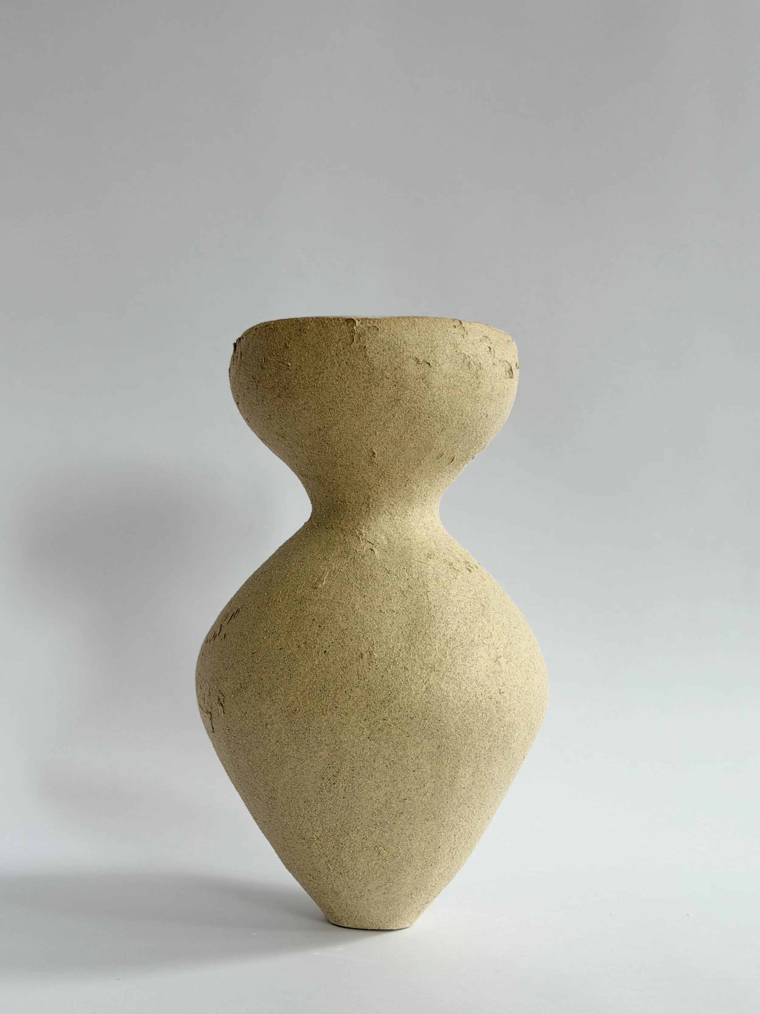 Silhouette Vase in Beige by Anastasia Babenko — tracing a woman's full, rounded silhouette in beige stoneware, sculptural decor for
