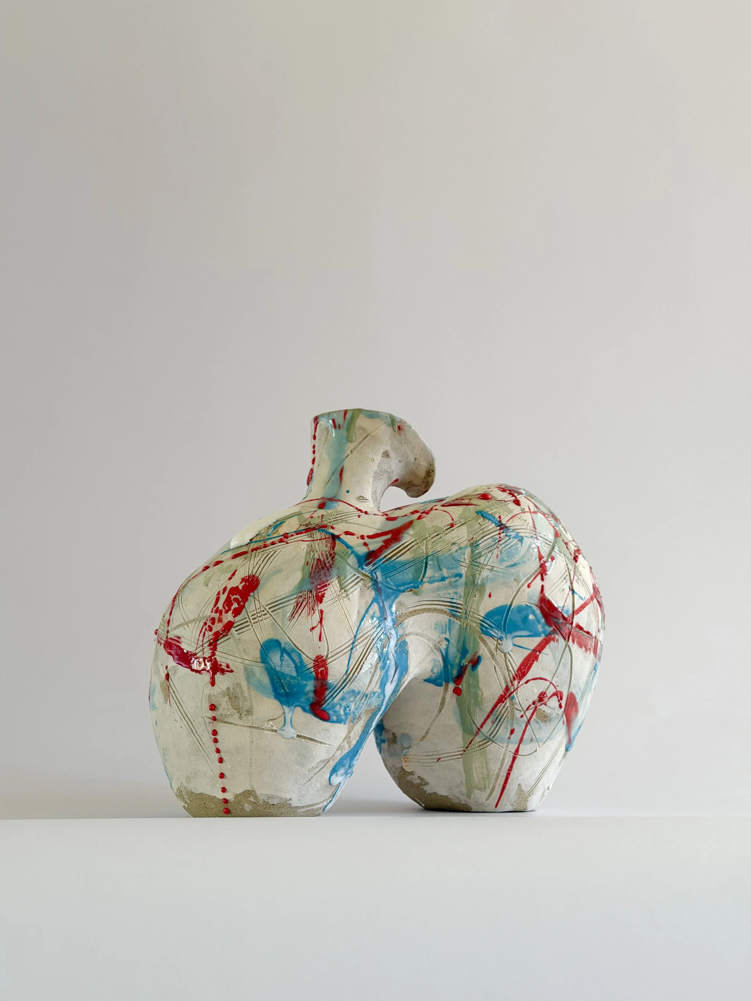 Form No. 2, with runny white glaze over red, turquoise and green and fine incised lines — sculptural ceramic vase sculptural decor for