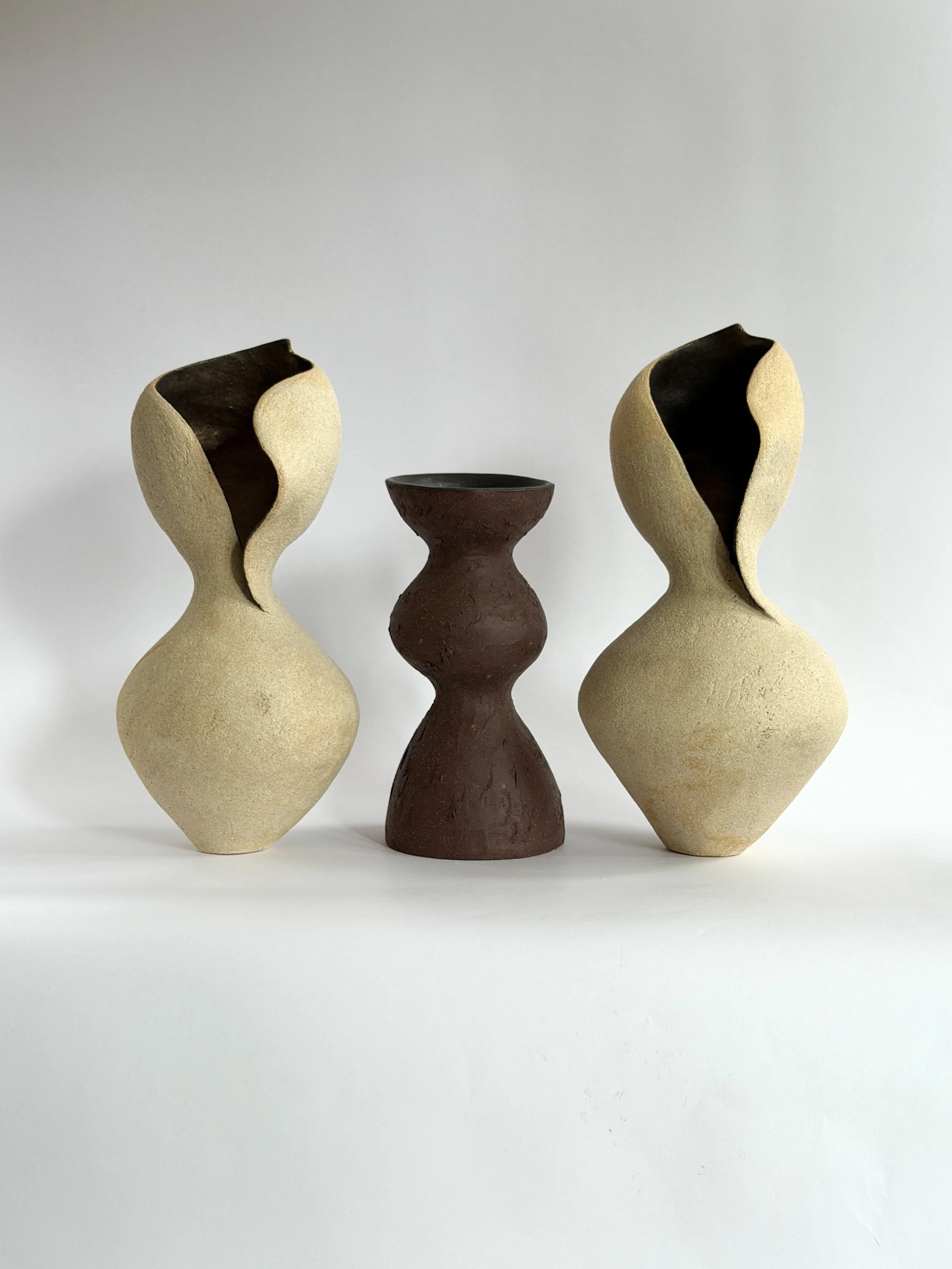Dark Brown Totem Vase, with a brutalist, totem-like architectural silhouette in deep brown stoneware — sculptural ceramic vase made for