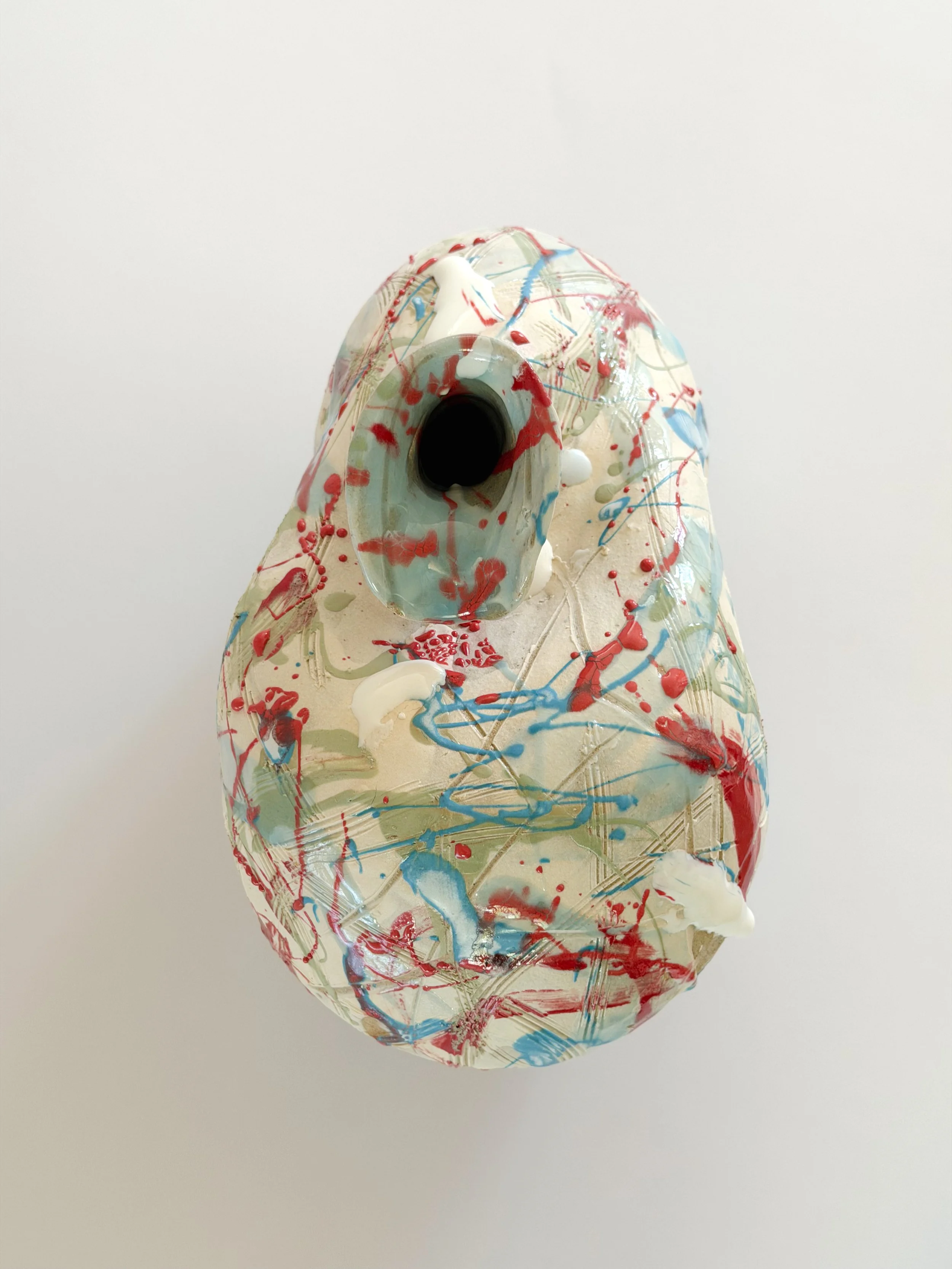 Form No. 2 — hand-built ceramic vase with runny white glaze over red, turquoise and green and fine incised lines, by Anastasia Babenko