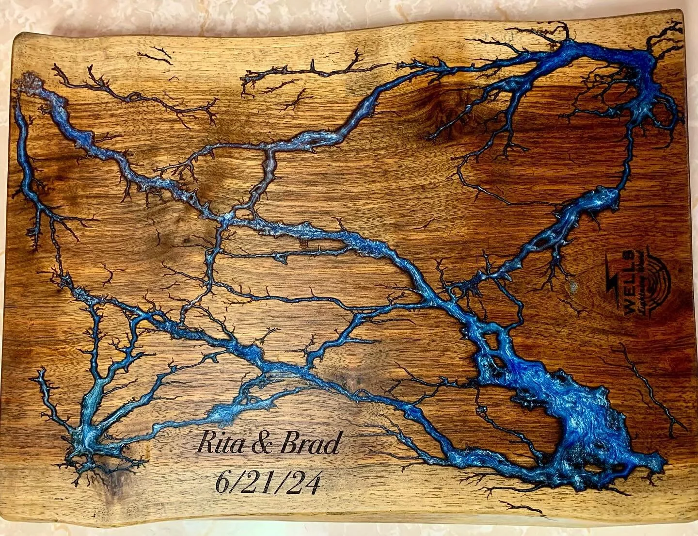 Just laser engraved this board as an anniversary gift! #charcuterie #charcuterieboard #fractalwoodburning #fractal #fractalart #fractalburningwoodart #fractalburning #epoxy #epoxyresin #epoxyart #epoxyartwork #epoxyresinart #epoxyresinartwork #wood #