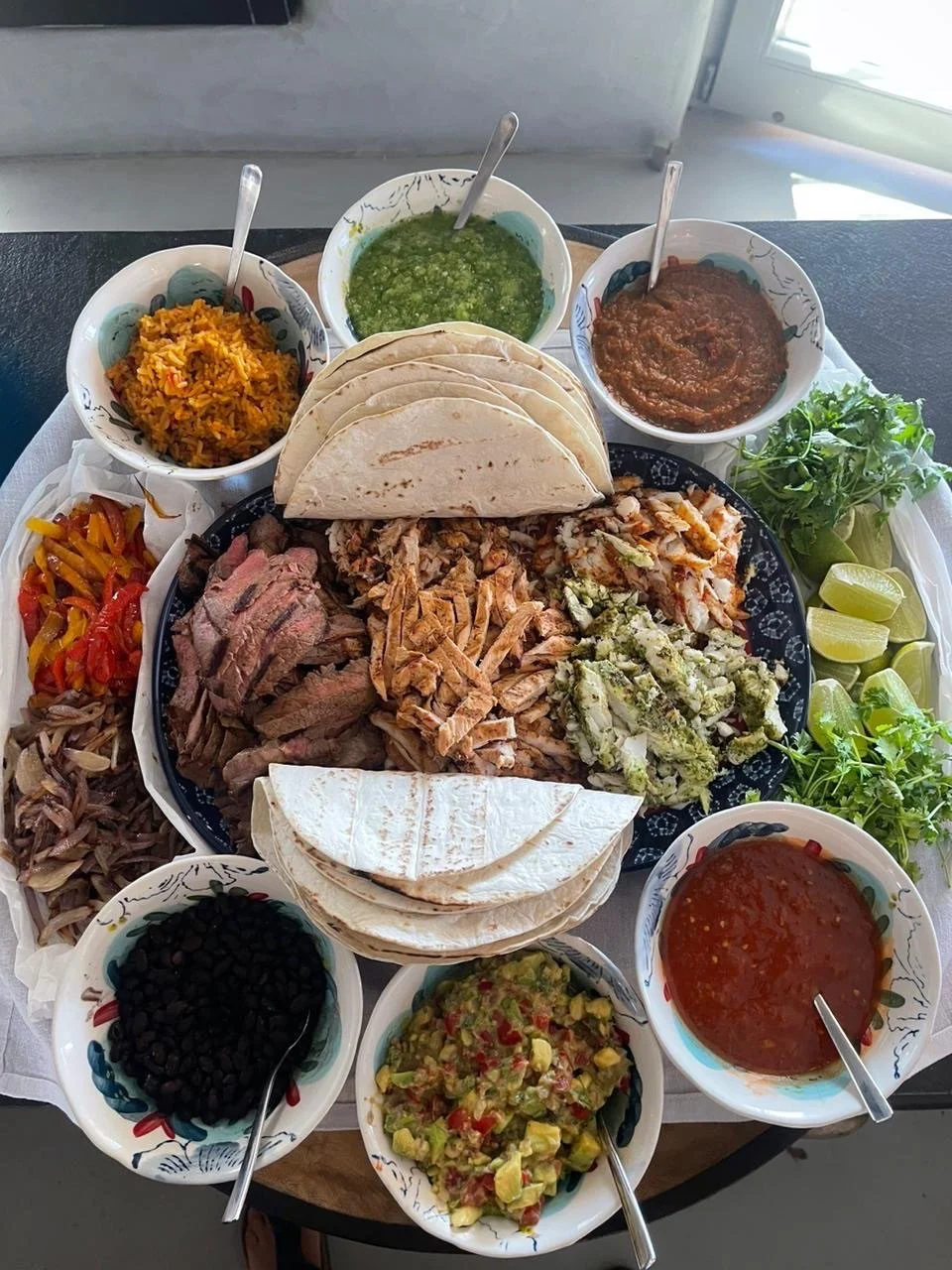 Mexican Platter, Guacamole,Beef,Fish,Chicken,Rice,Beans,Lime,Salsas