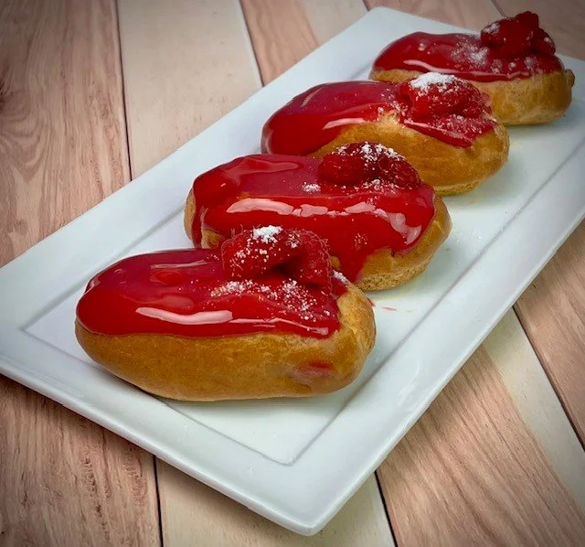 Be the life of the business meeting by adding a ~little treat~ to your Sinplicity Catering buffet! Try our seasonal crowd pleaser:
🍓Summer Raspberry Eclairs with Vanilla Creme🍓

Give our Hot Weather Specials a try before they're gone! Available unt