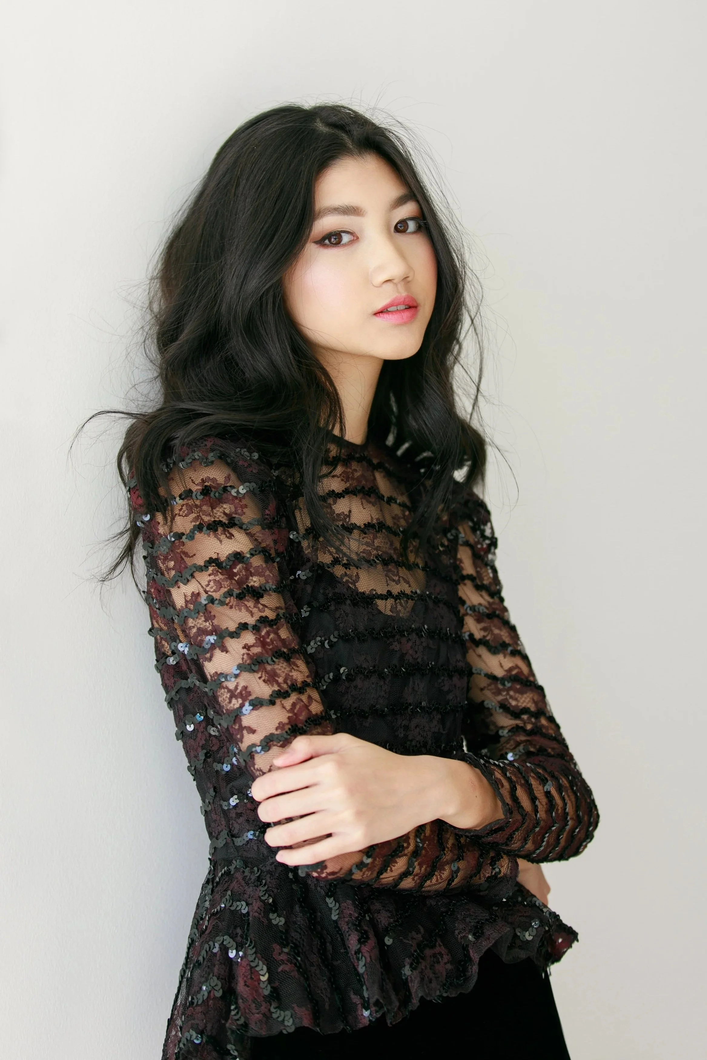 Portrait of a woman wearing a sequin top