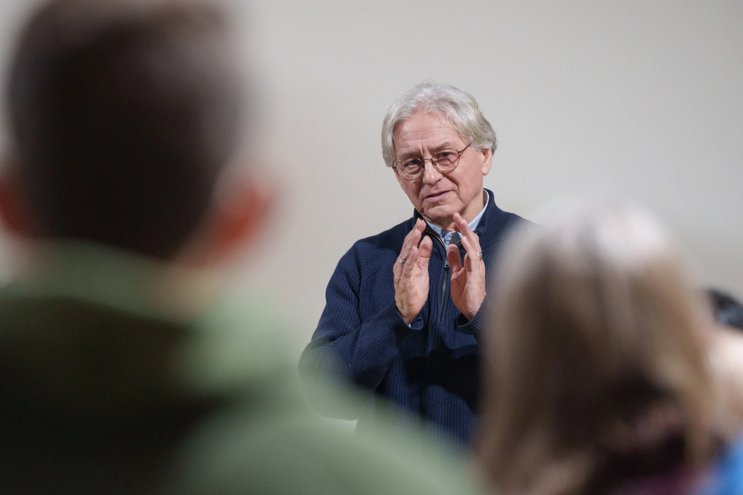 Tom in Gustavus_CC_close up with hands.jpg