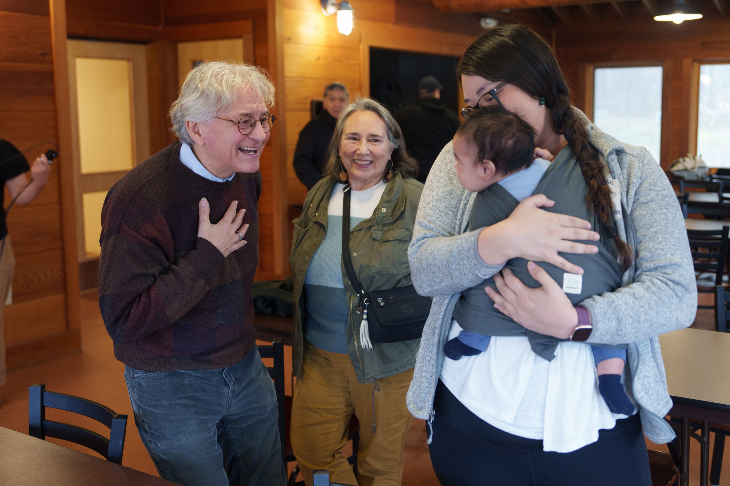 Tom in Kluwan_CC_smiling with baby photo.jpg