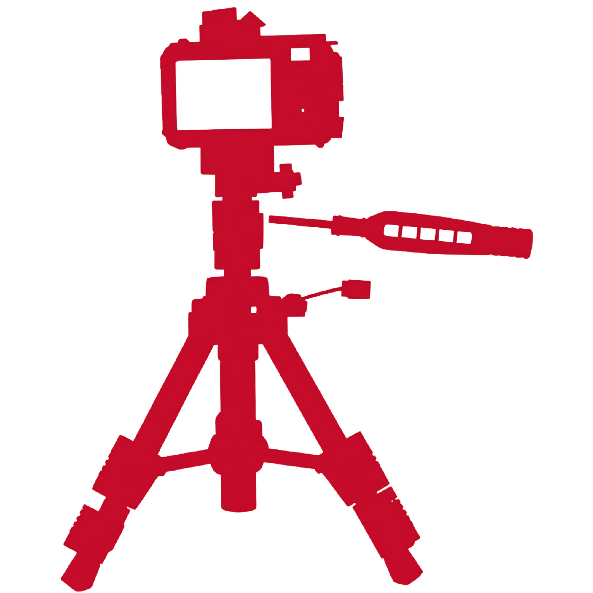 A woman and a man sitting at a table being recorded by a video camera in a studio.