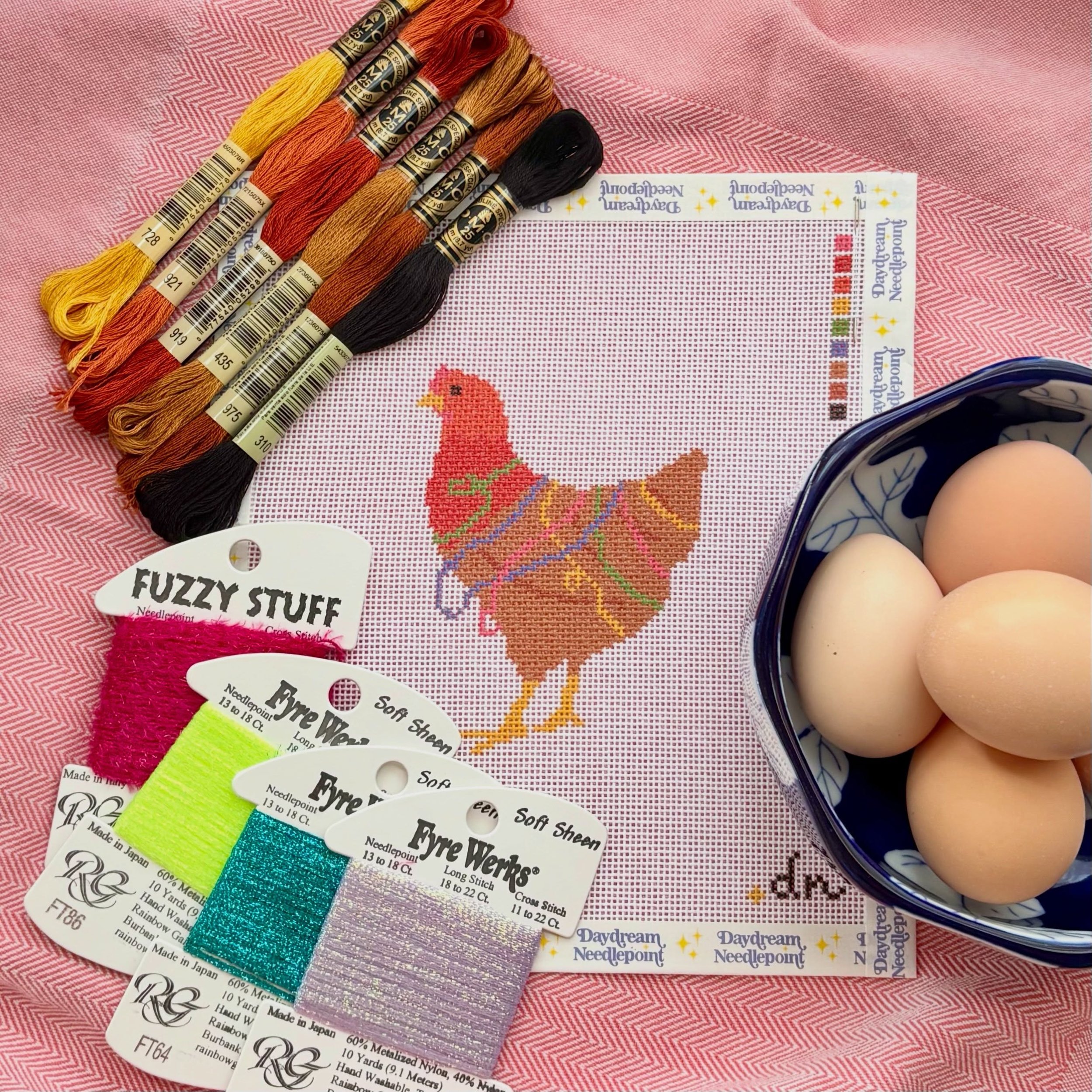 I love my @daydreamneedlepoint thread chicken so much. The only swap I&rsquo;m making is disco threads because yes. Photo staged with eggs from my own backyard hens. Chicken photos included while they have their Sunday Funday free range bug hunt. 10/