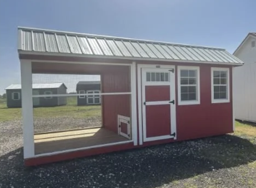 A red chicken coop on a Cover Your Asset's lot.