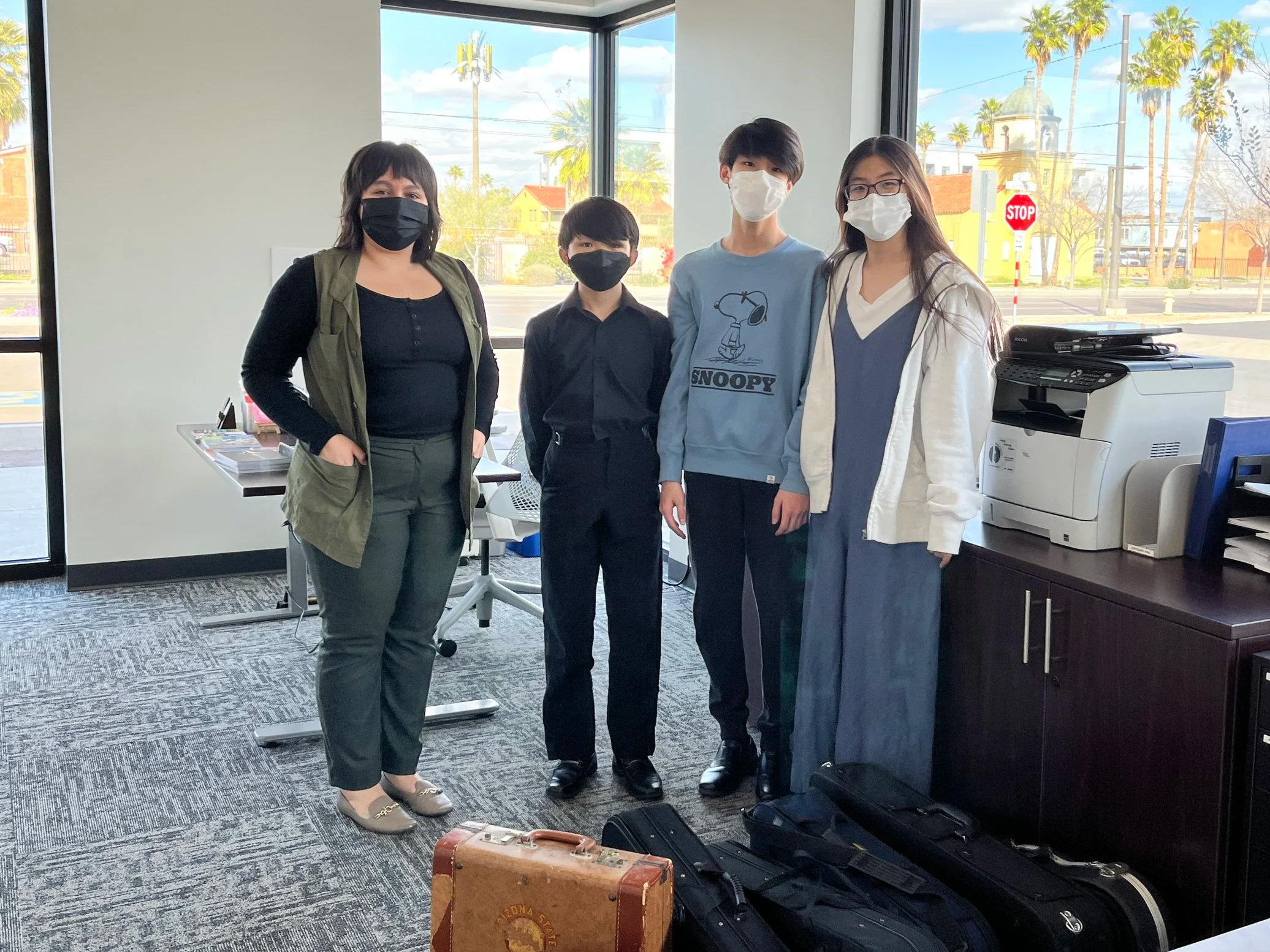 Kang Siblings visited Rosie's House to donate gently used instruments