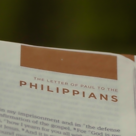 Close-up of a printed page displaying the title "The Letter of Paul to the Philippians" with the word "PHILIPPIANS" in large, bold letters.