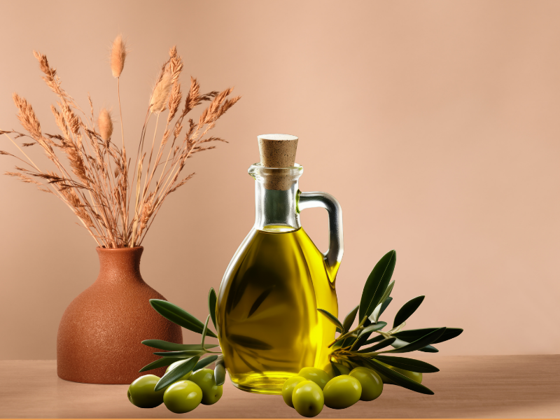 Jojoba Oil bottle and natural form of jojoba.