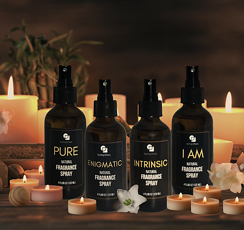Fragrances in a soft setting with candles and flowers