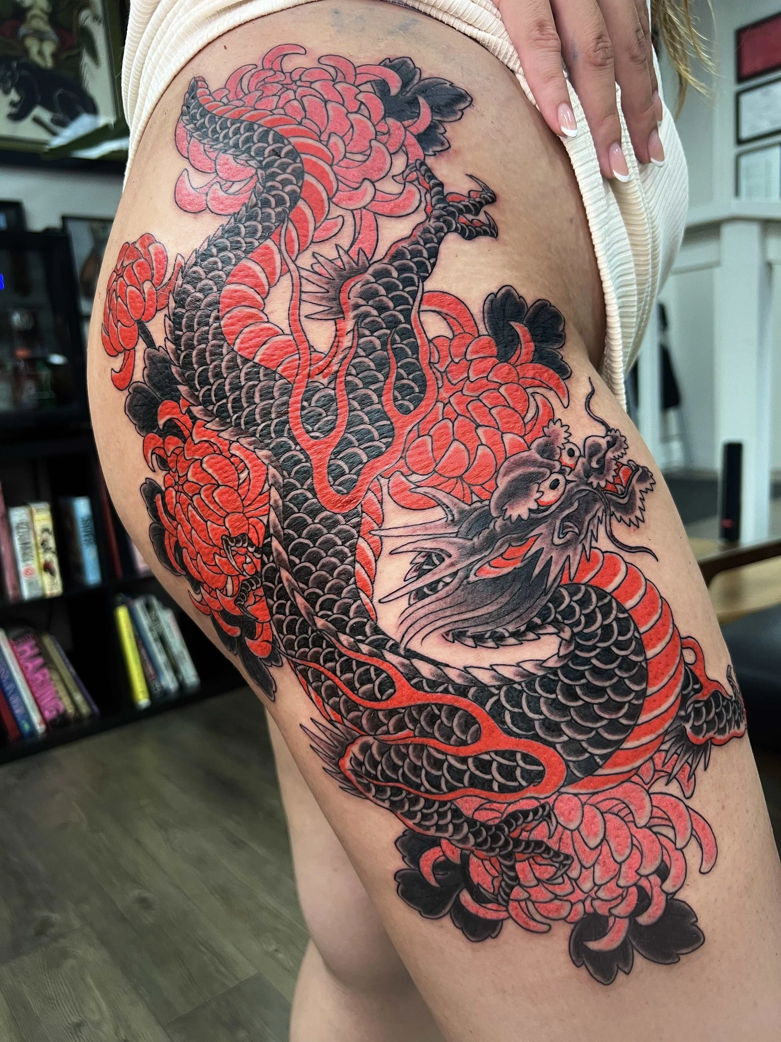 Japanese dragon tattoo feminine thigh placement by Atlanta tattoo artist Wes Holland