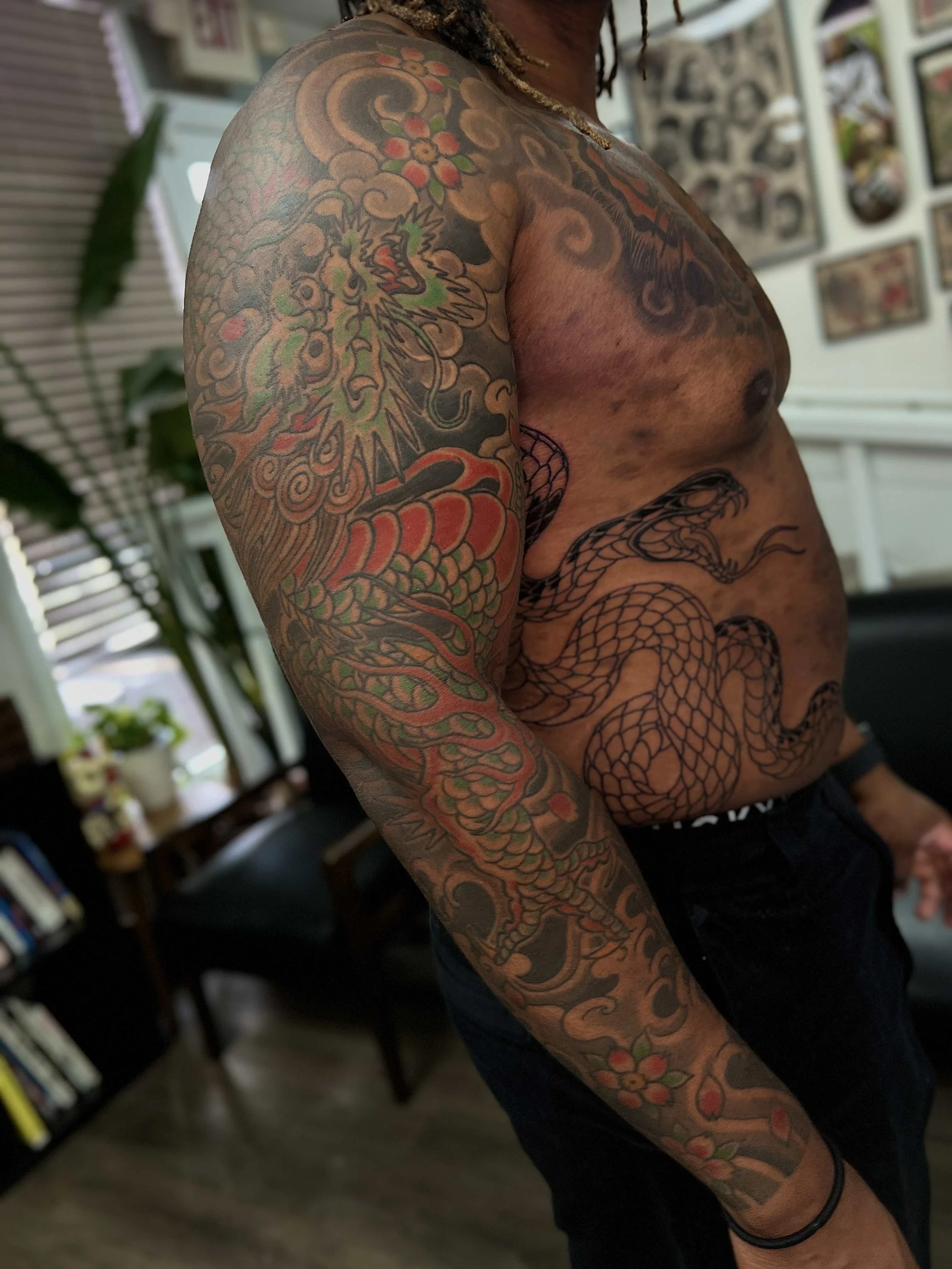 Color Tattoo on Dark Skin Japanese Tattoo Sleeve by Atlanta tattoo artist Wes Holland