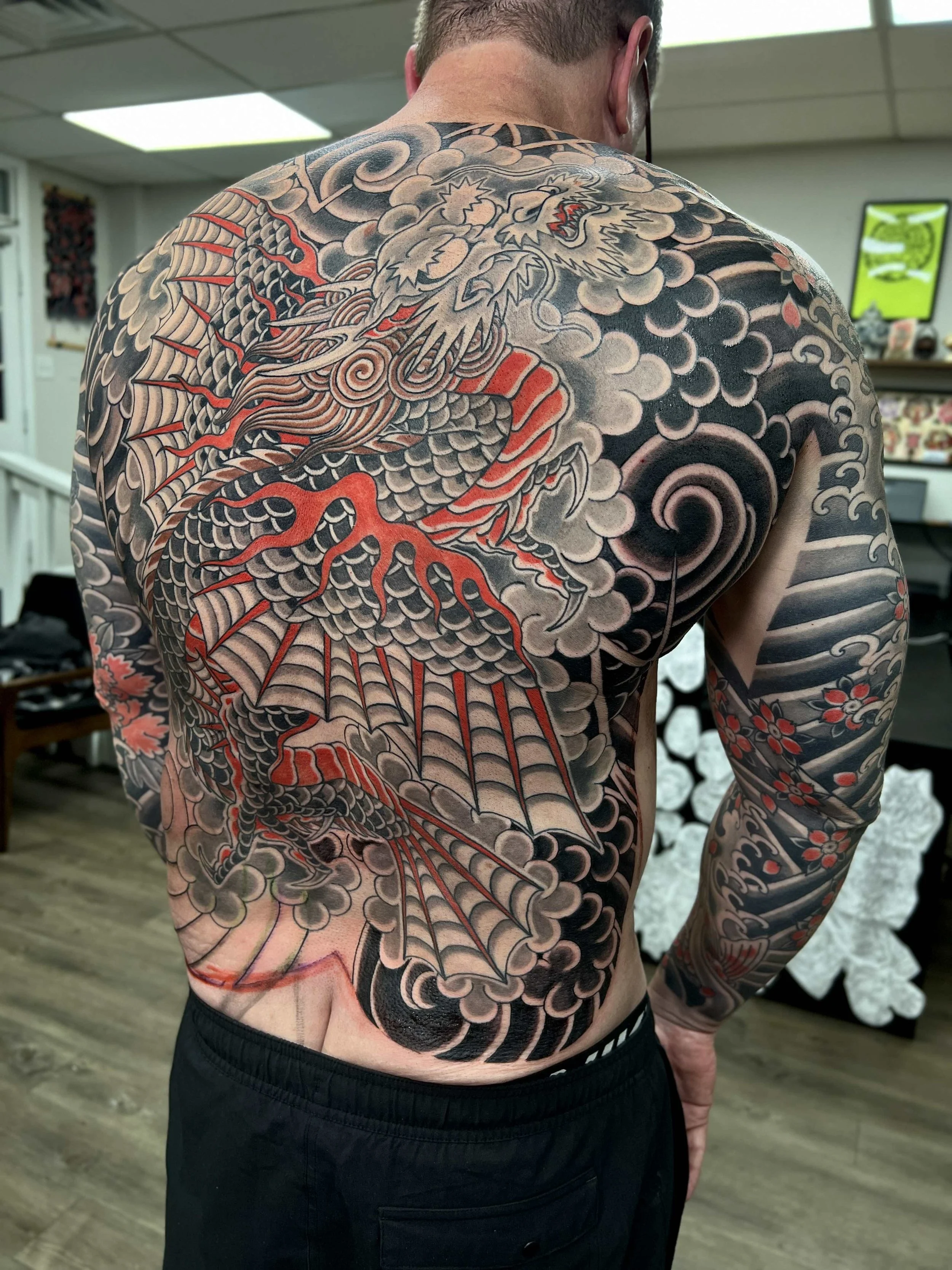Japanese dragon tattoo background in progress by Atlanta tattoo artist Wes Holland