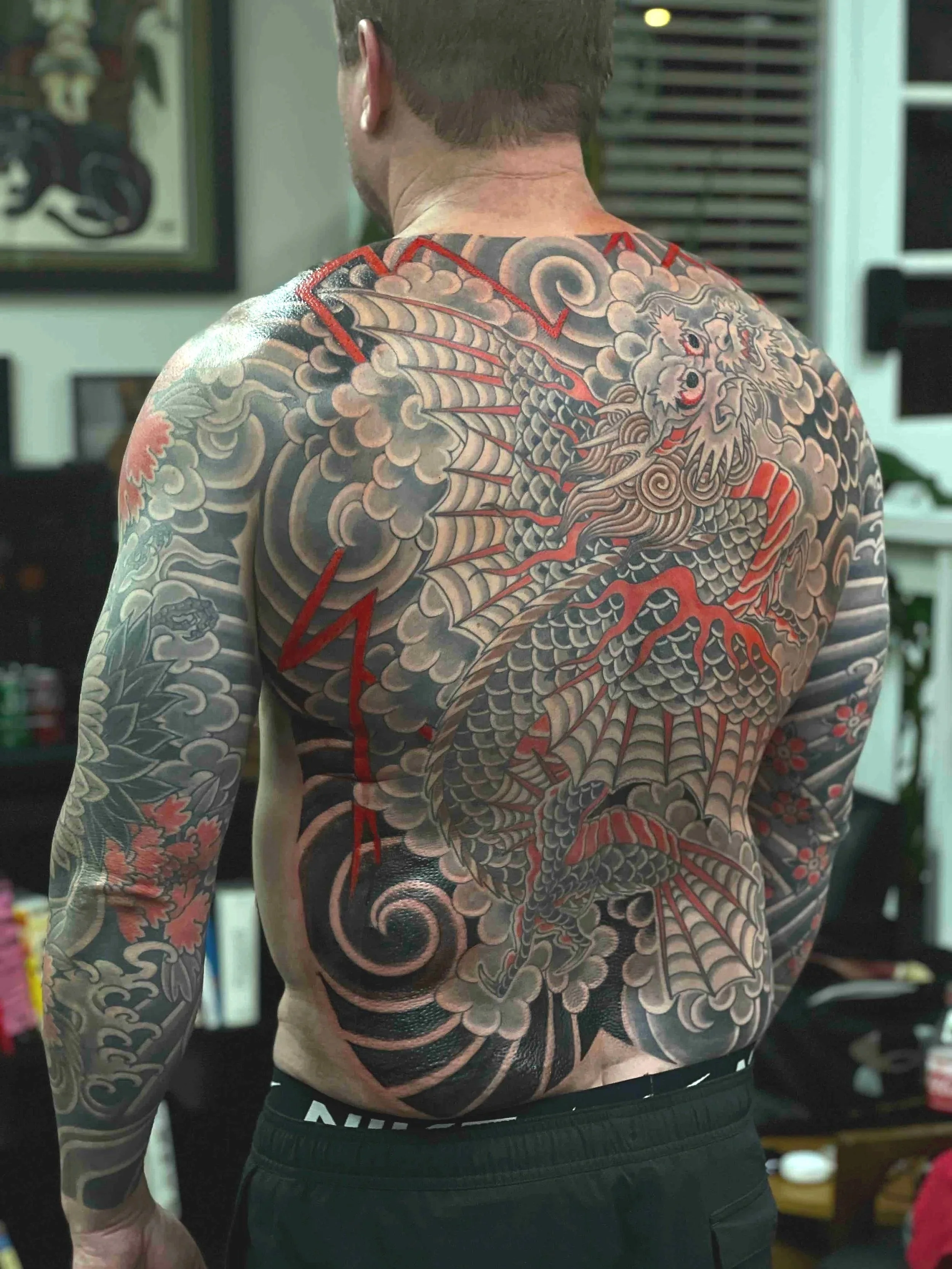 Japanese flying dragon tattoo back piece by Atlanta tattoo artist Wes Holland
