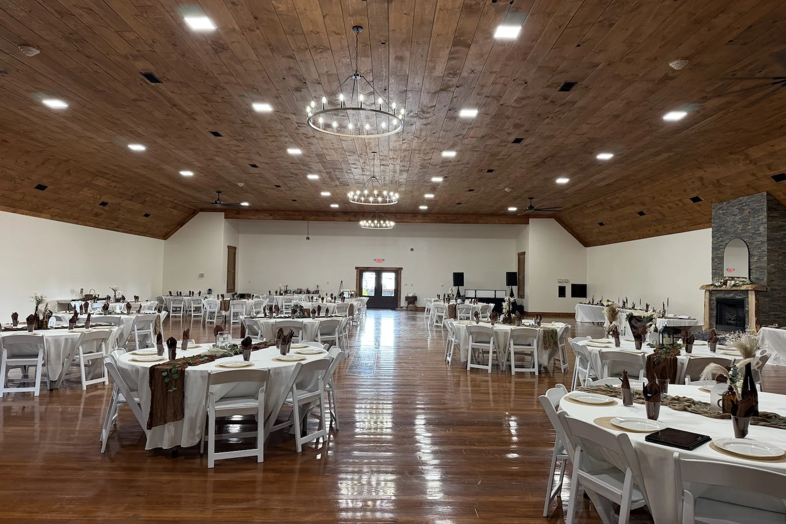 Wedding reception setup in the main hall at God's Country Venue in Oak Hill, Ohio