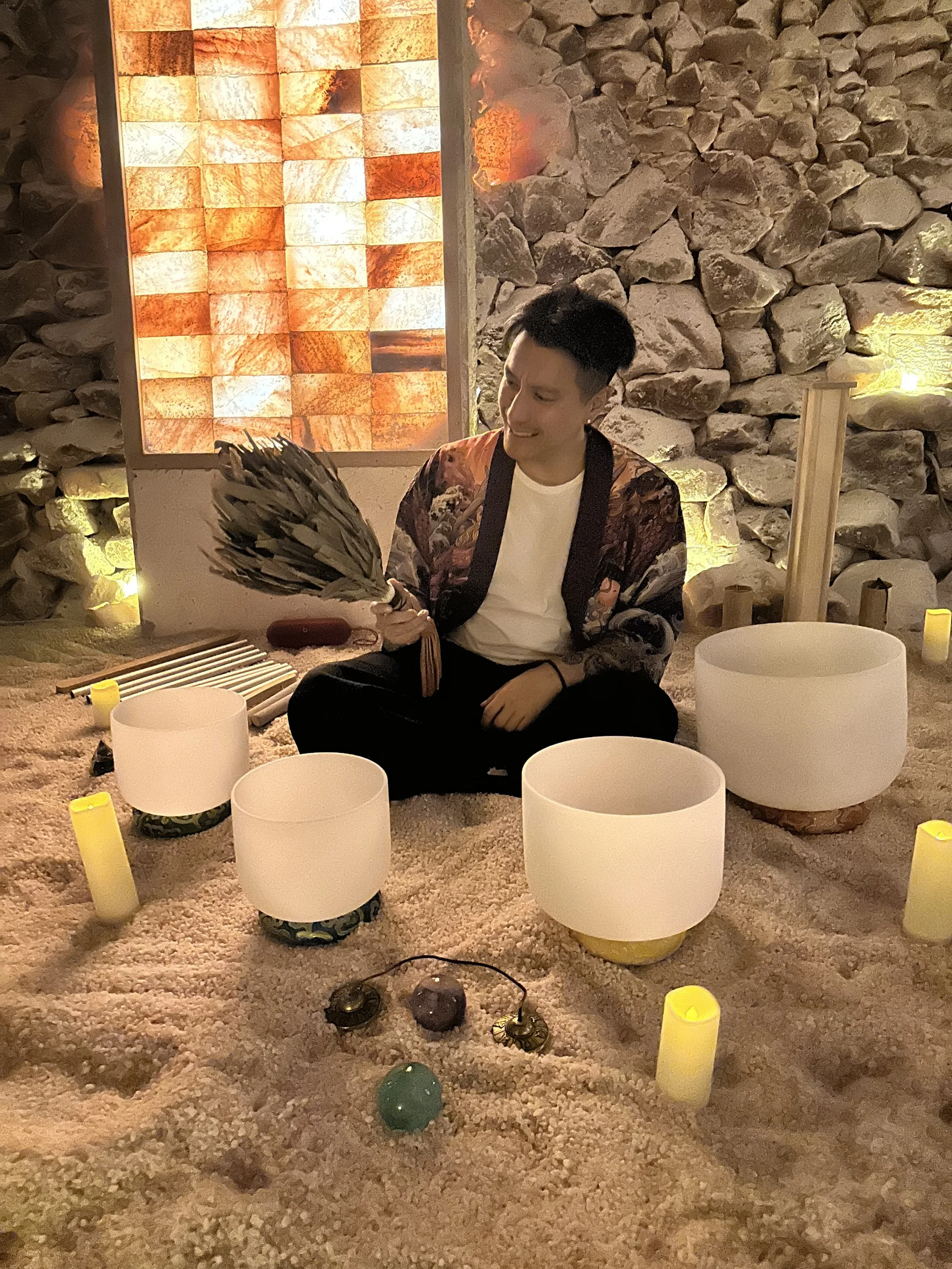 Alex Ma from Solar Soul Circle staring at his chakapa for a sound bath at the Saltwonder Himalayan Salt Cave in North Vancouver