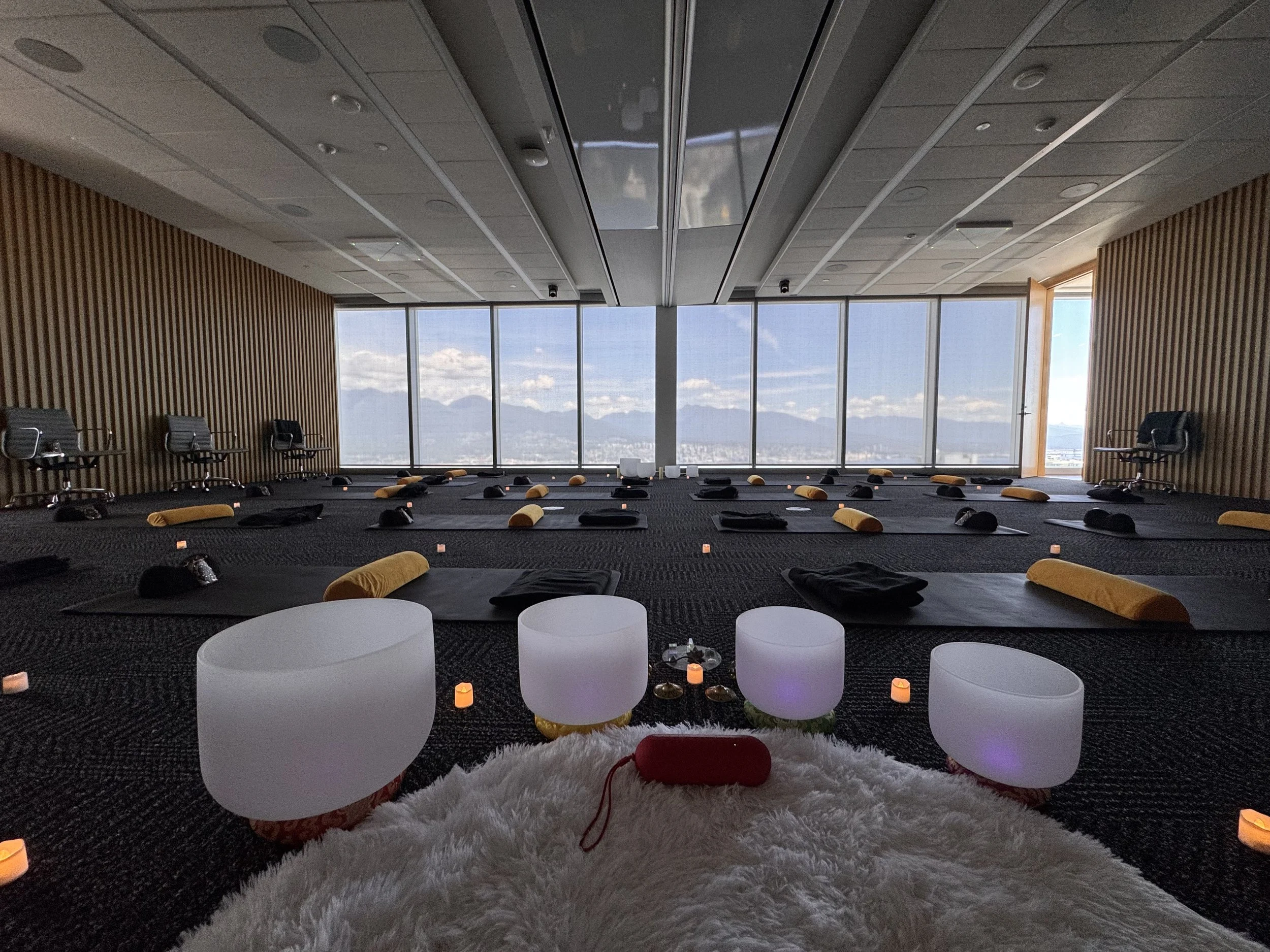 A POV view of a corporate sound bath in Coal Harbour by Solar Soul Circle