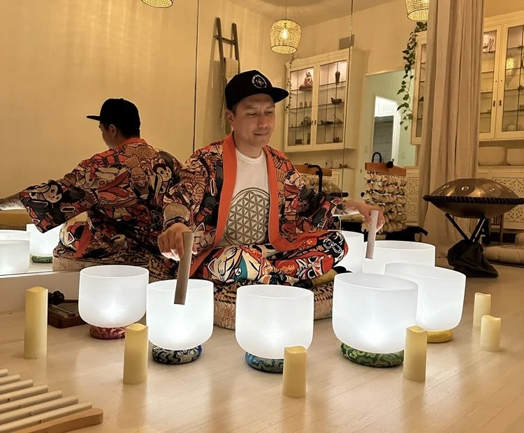 Sound therapy in Vancouver with crystal singing bowls, candlelight and calming live sound created by Alex Ma from Solar Soul Circle.