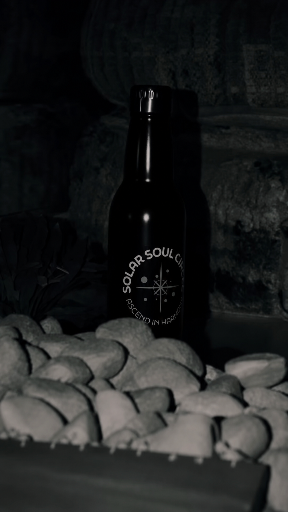 A Solar Soul Circle water bottle in black and white