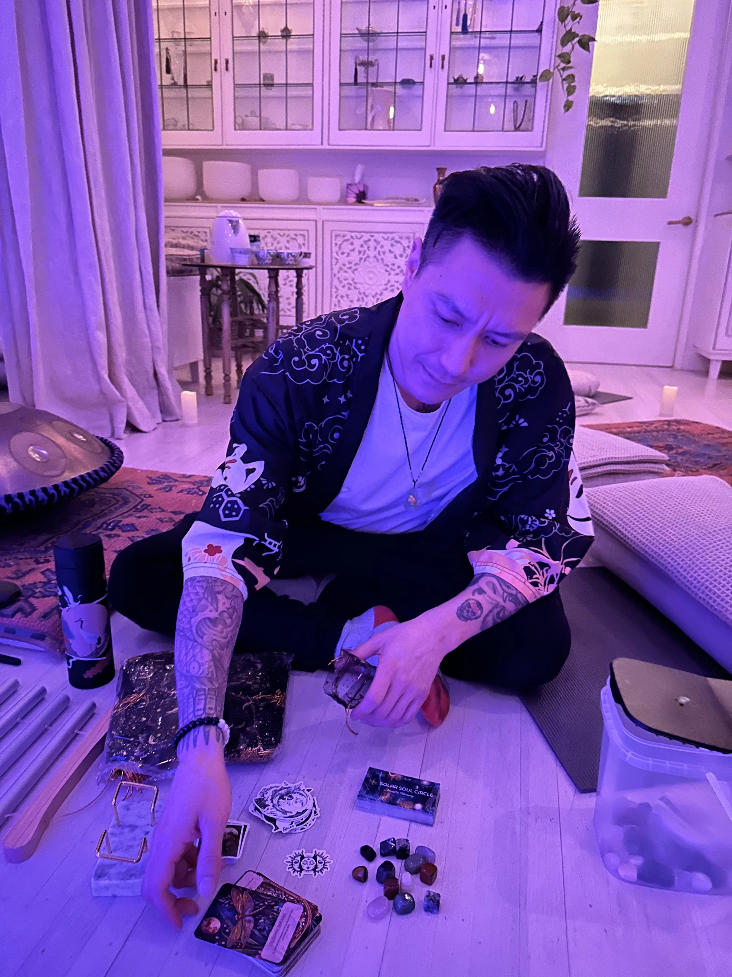 Alex Ma from Solar Soul Circle preparing gift bags for his sound healing guests at Love & Peace Studio in Kitsilano Vancouver
