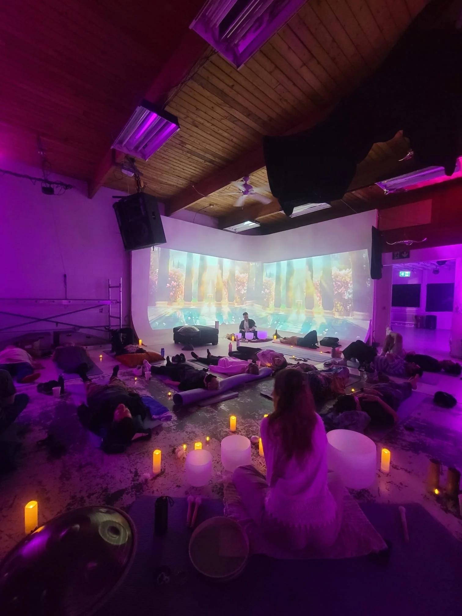 Vancouver group sound bath and sound healing event with crystal singing bowls, calming visuals, candles, and sound therapy for nervous system relaxation.