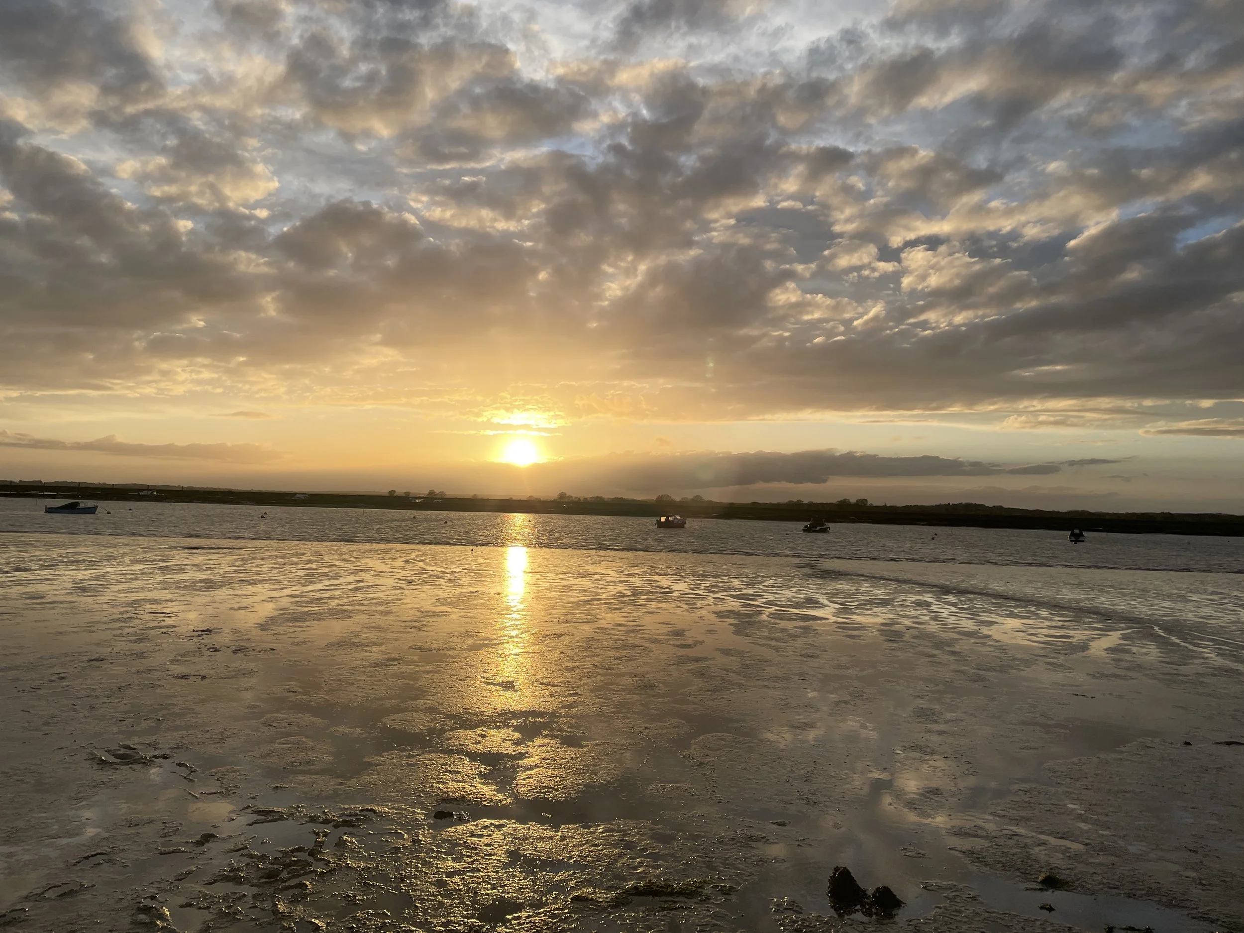 Sunset over coastal sea waters