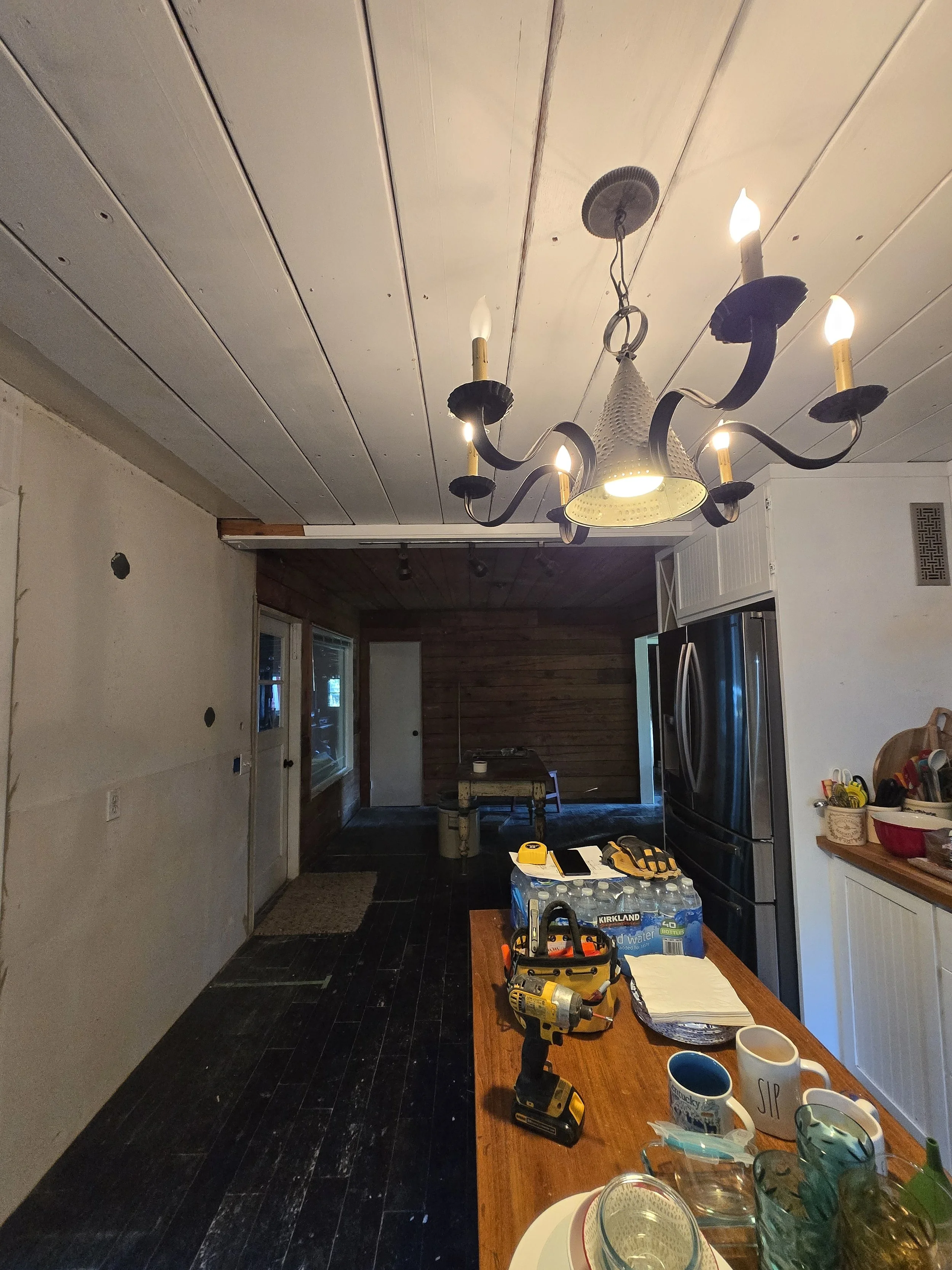 Kitchen remodel drywall work in Junction City, Oregon, including wall and ceiling installation, patching, and preparation for a light orange peel texture finish.