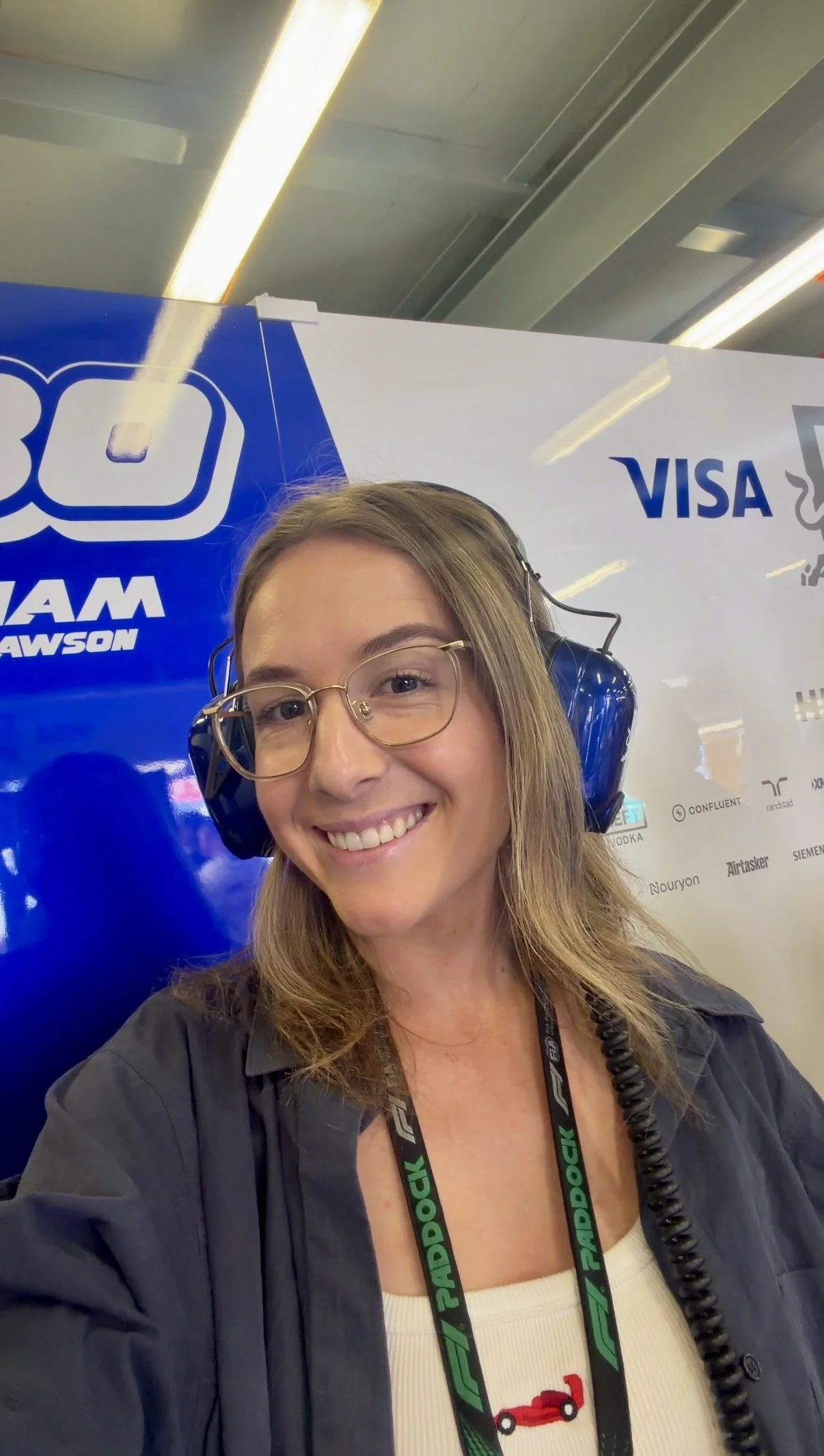 Danii is an Australian F1 content creator based in Melbourne, pictured in the Racing Bulls garage.