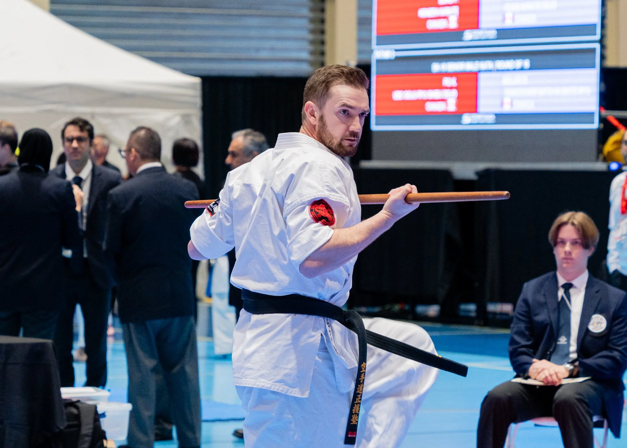 Sensei Nick performs staff kata in a tournament.