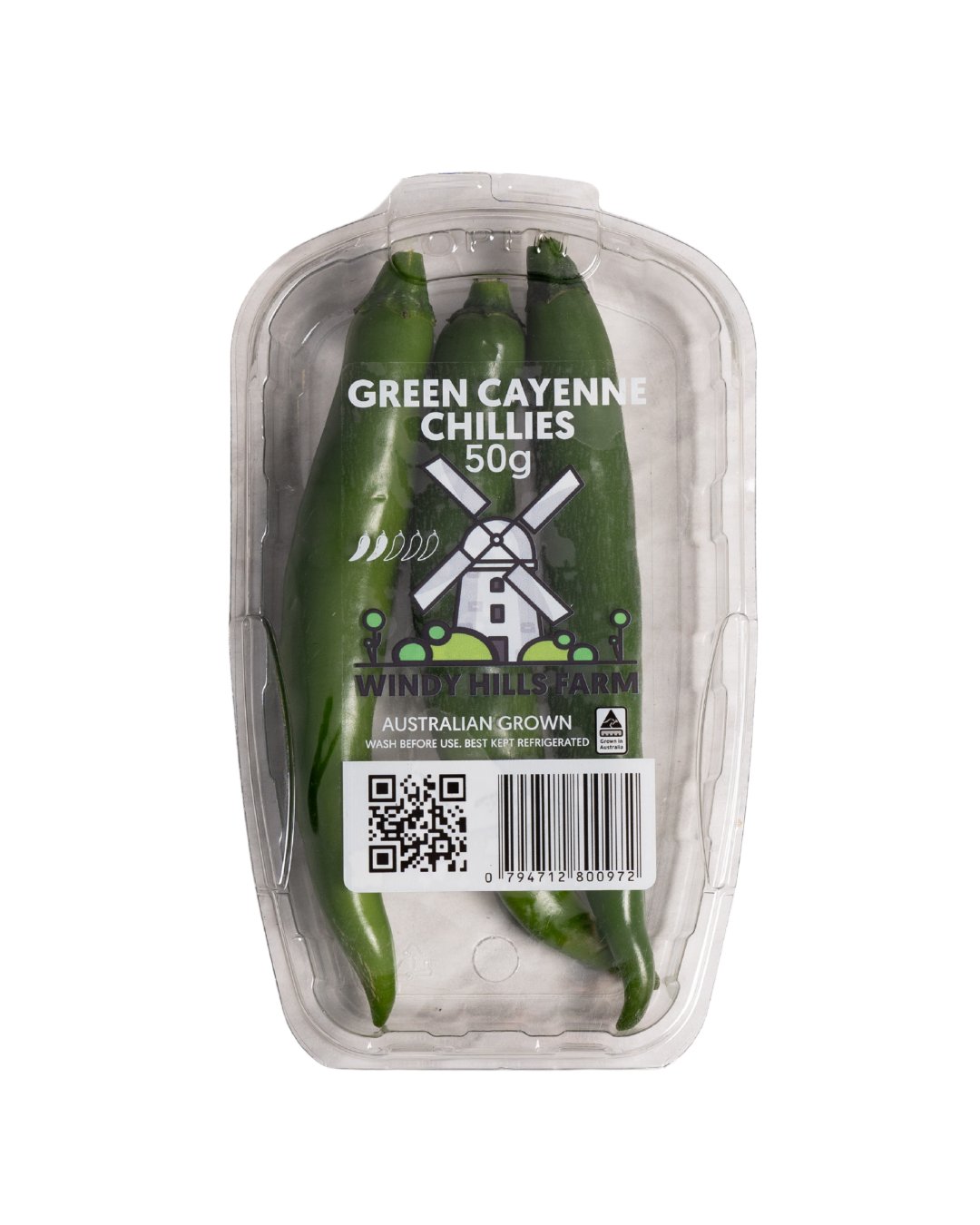 Package of green cayenne chilies on a clear plastic tray, labeled as 50 grams from Windy Hills Farm, Australian grown.