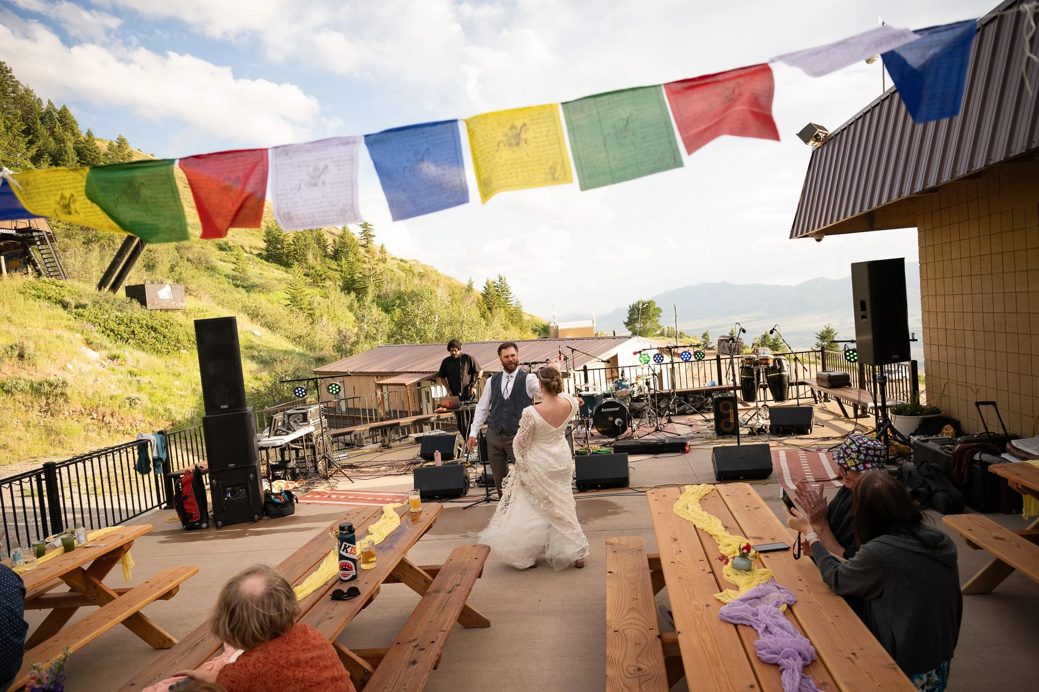 prayer flags and picnic tables
