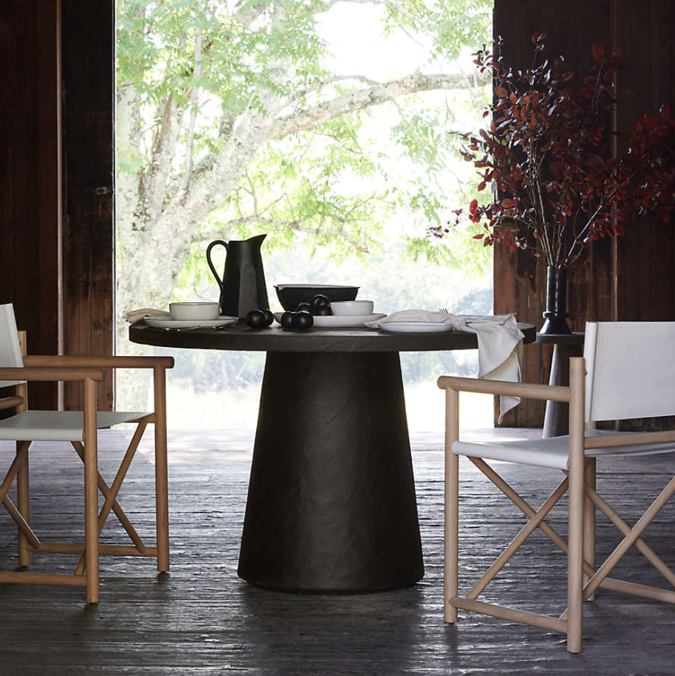 Crate &amp; Barrel product gallery items skipped. Undo. bestseller  Willy 32" Charcoal Brown Pedestal Bistro Table by Leanne Ford